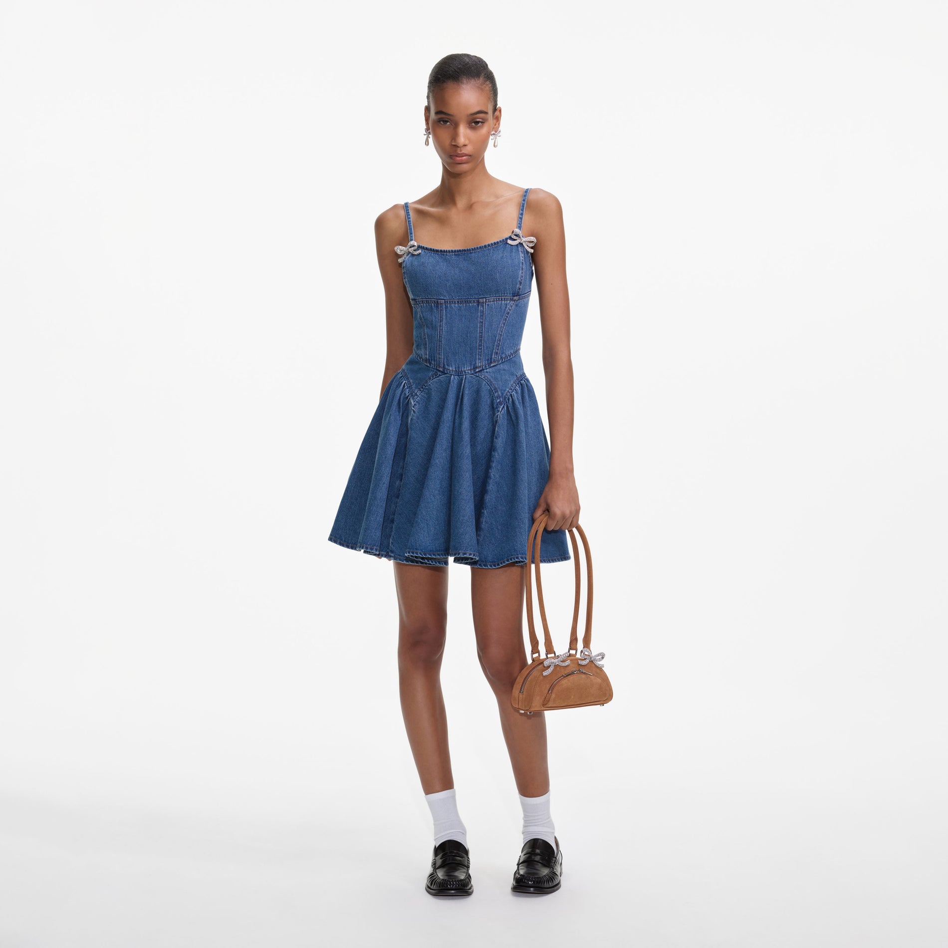 Front view of a woman wearing the Lightweight Denim Flared Mini Dress