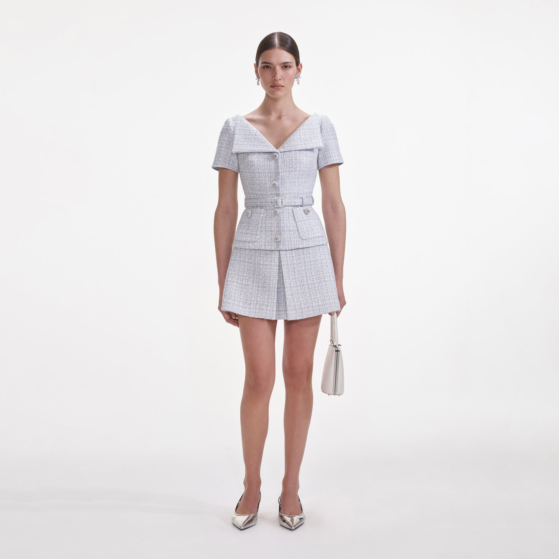 Front view of a woman wearing the Blue Boucle Top