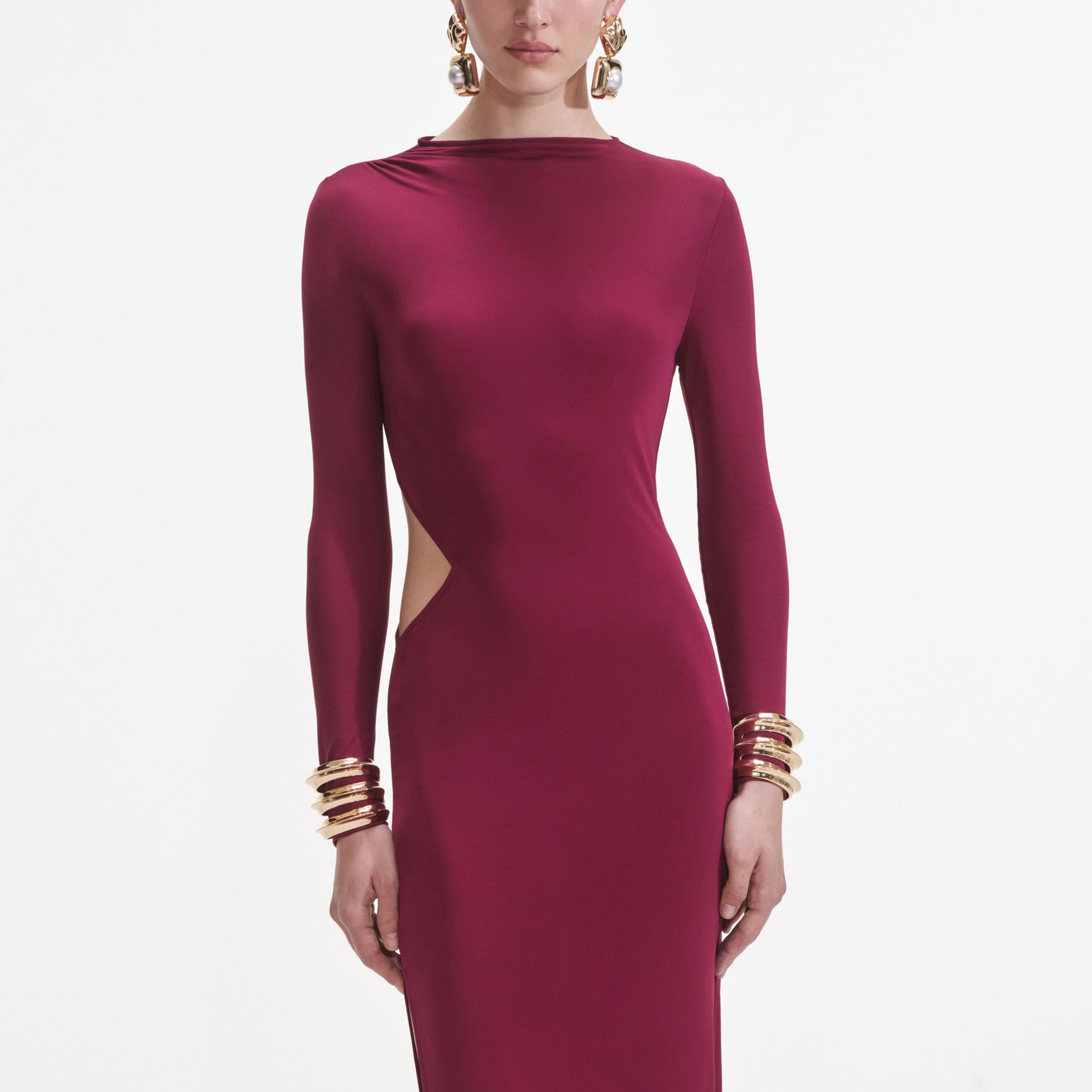 A close up of a woman wearing the Burgundy Jersey Gathered Midi Dress