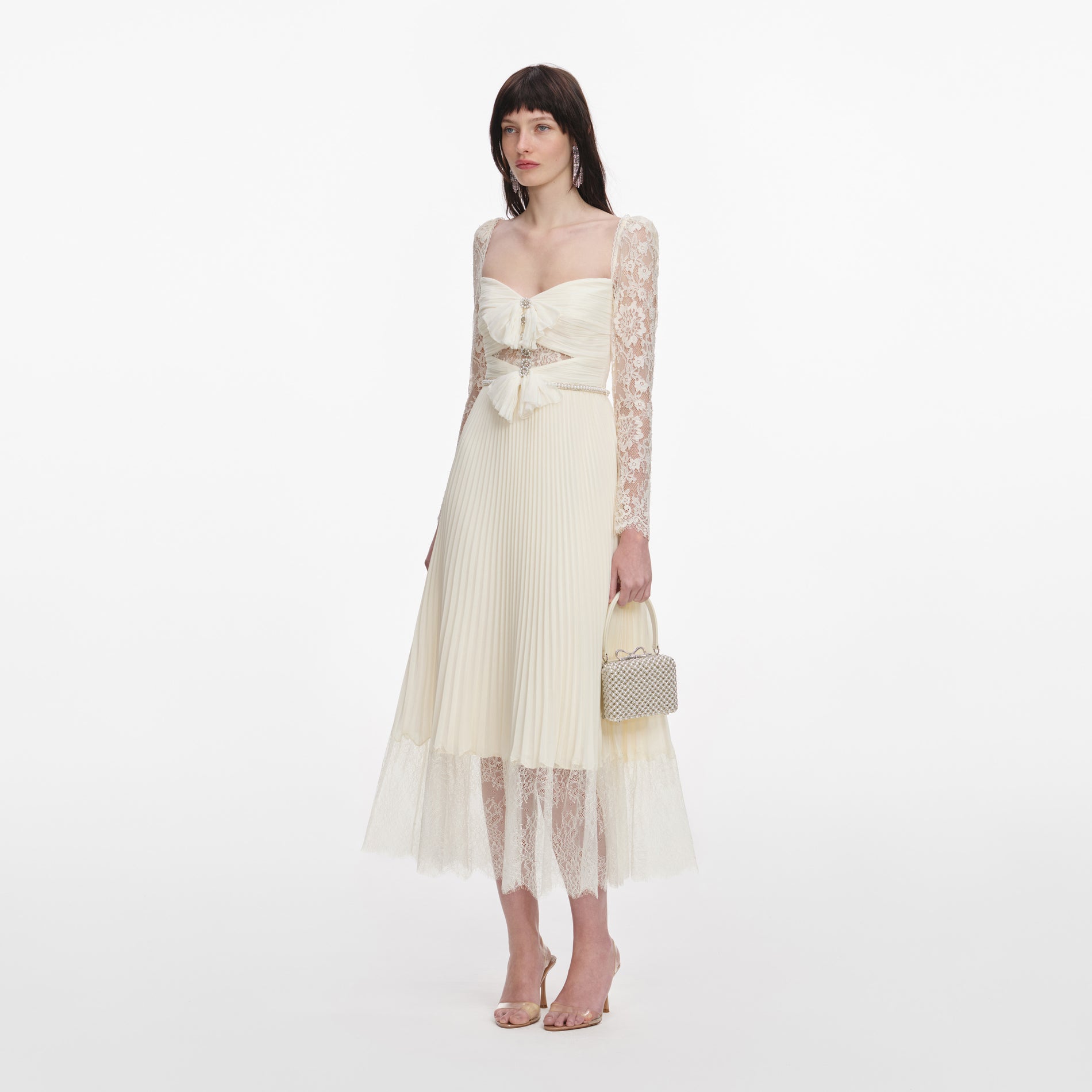Side view of a woman wearing the Cream Chiffon Lace Midi Dress