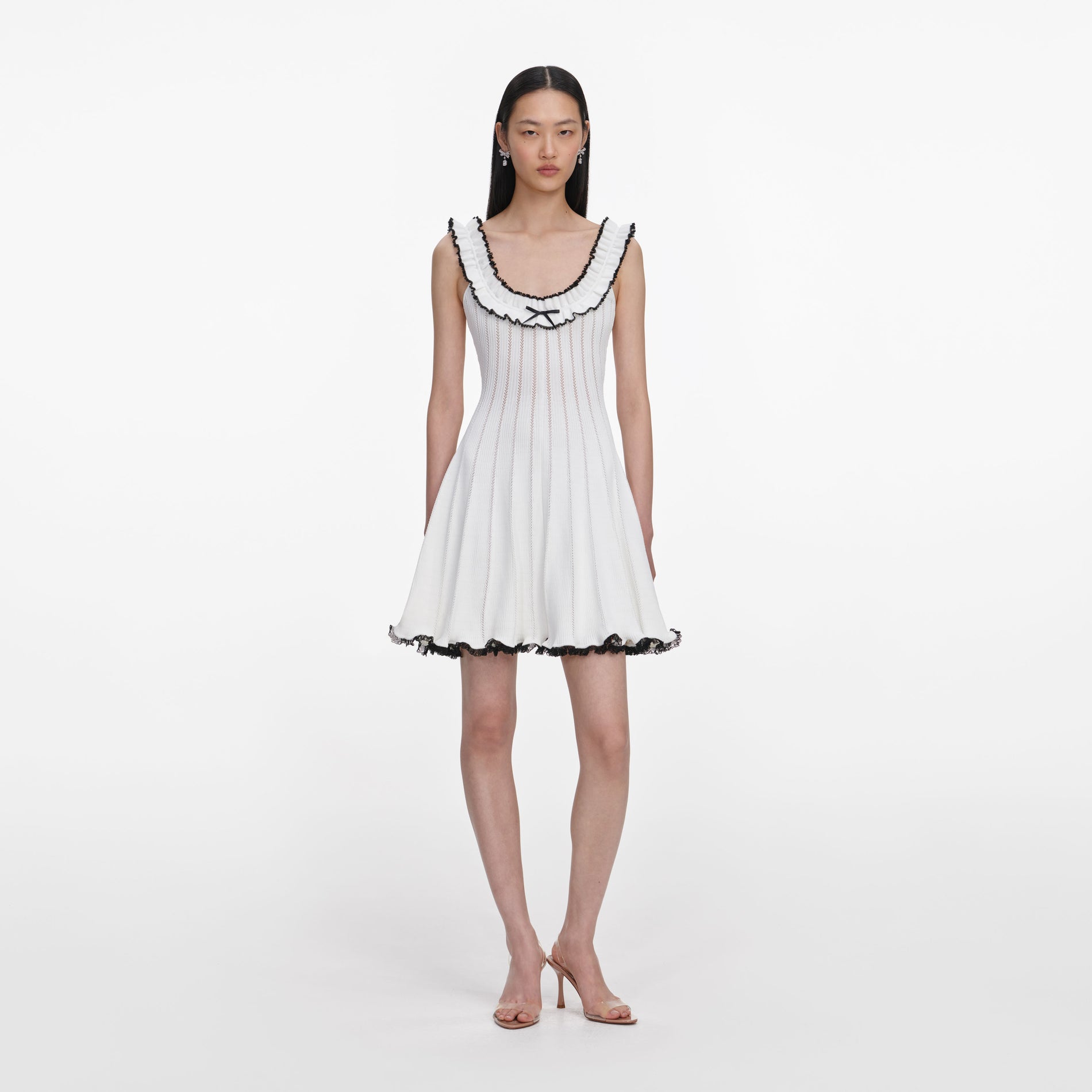 Front view of a woman wearing the White Contrast Trim Knit Mini Dress