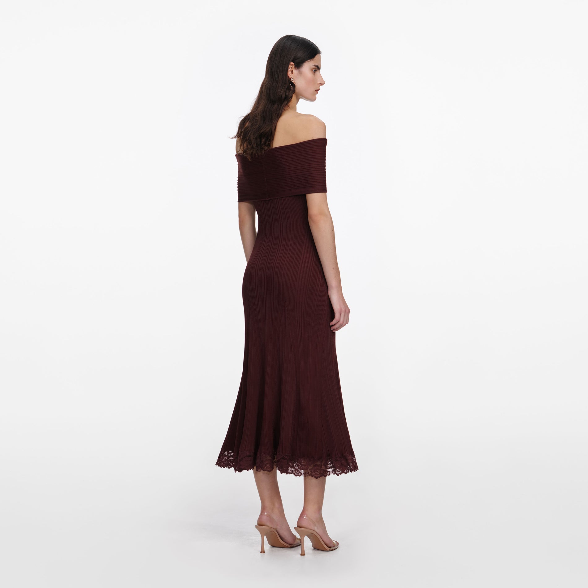 Back view of a woman wearing the Burgundy Knit Lace Insert Midi Dress