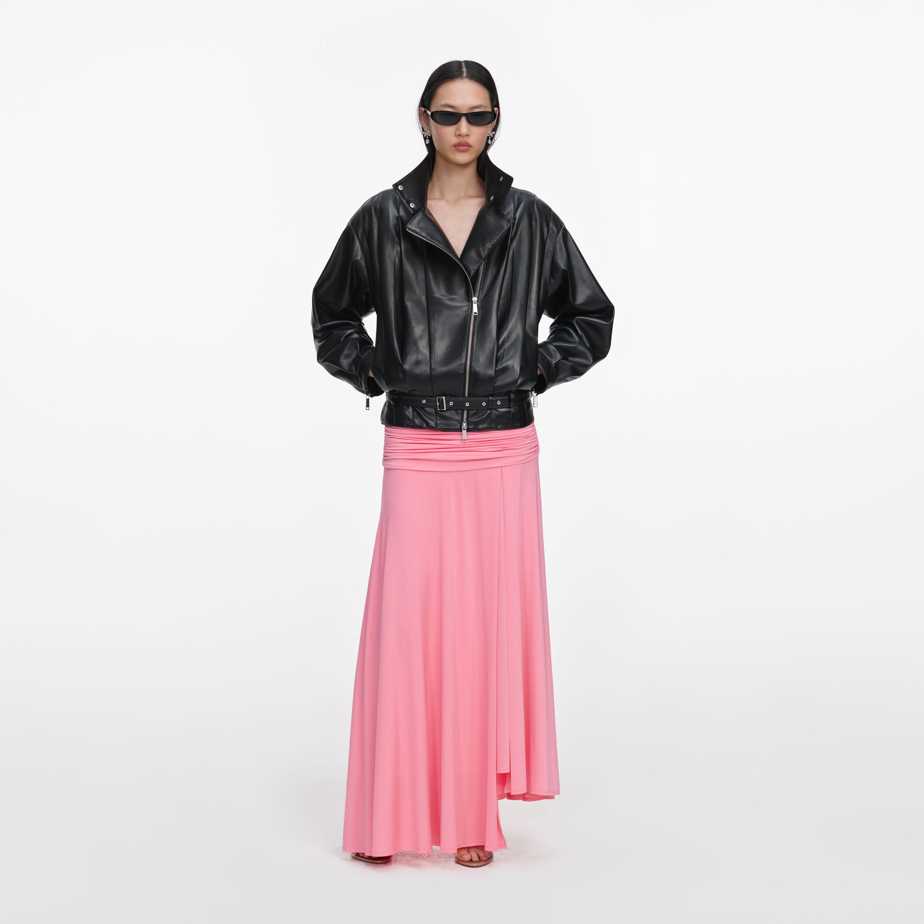 Front view of a woman wearing the Black Faux Leather Biker Jacket