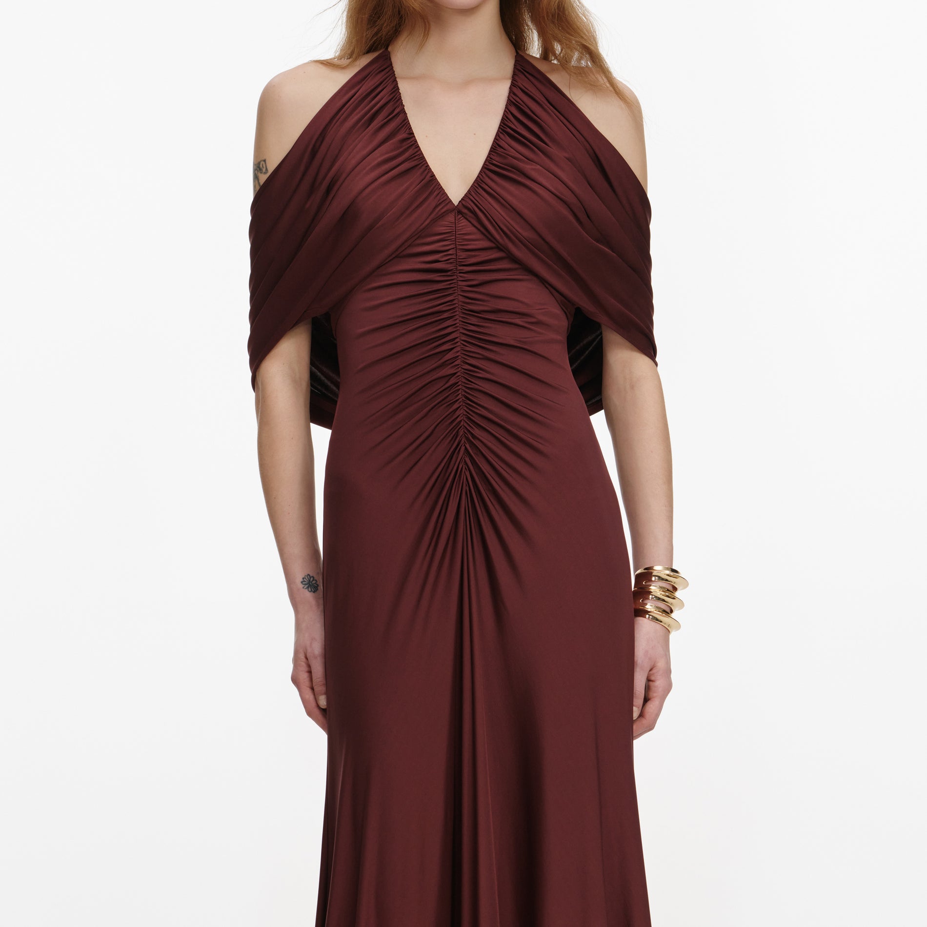 A close up of a woman wearing the Brown Jersey Drape Midi Dress