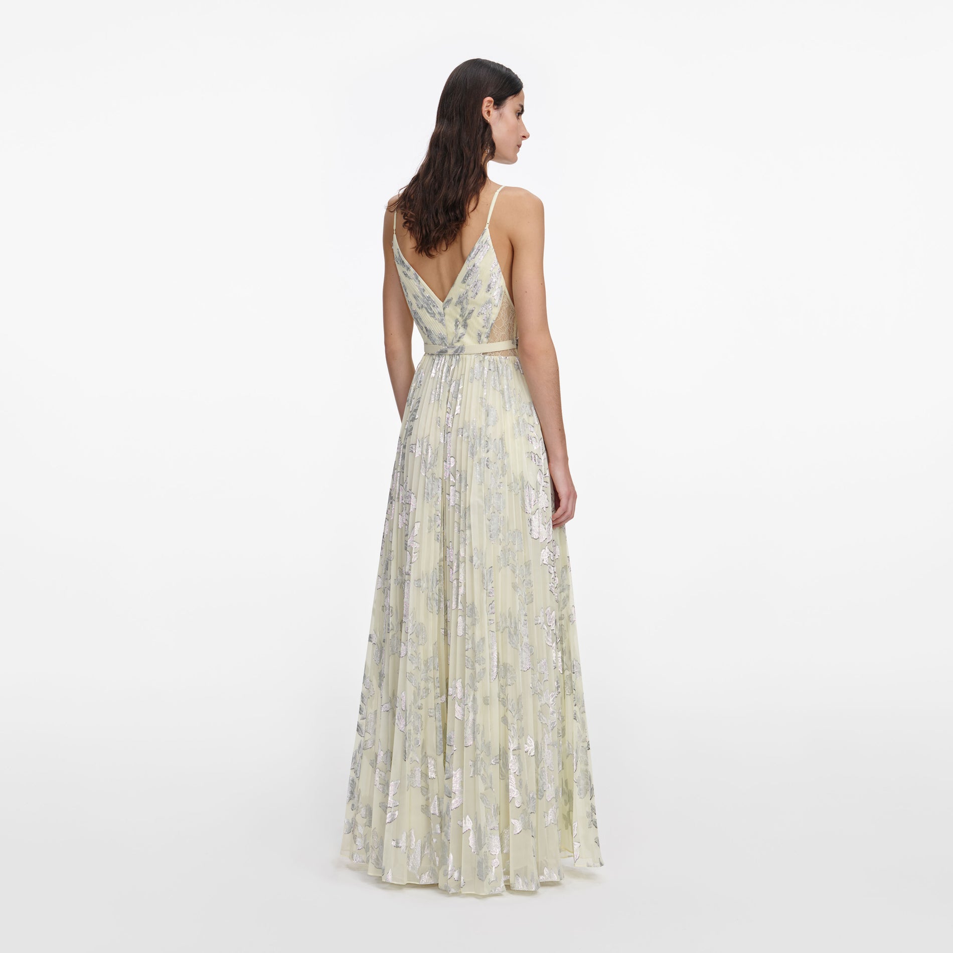 Back view of a woman wearing the Yellow Metallic Chiffon Maxi Dress