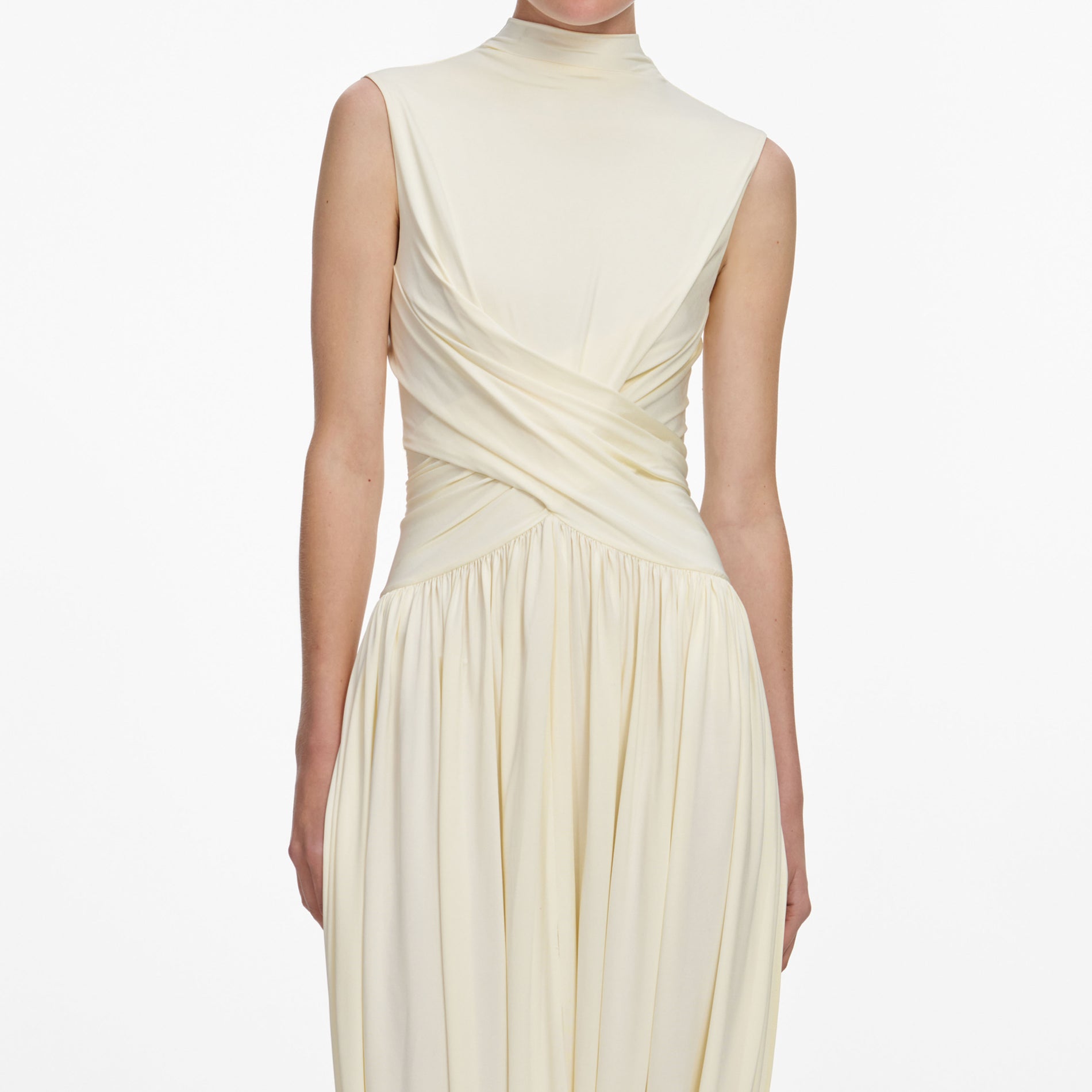 A close up of a woman wearing the Yellow Jersey Wrap Midi Dress