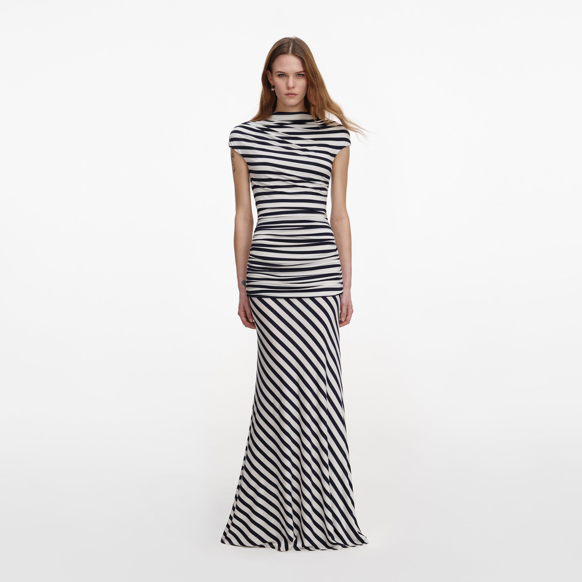 Front view of a woman wearing the Navy Stripe Jersey Maxi Dress