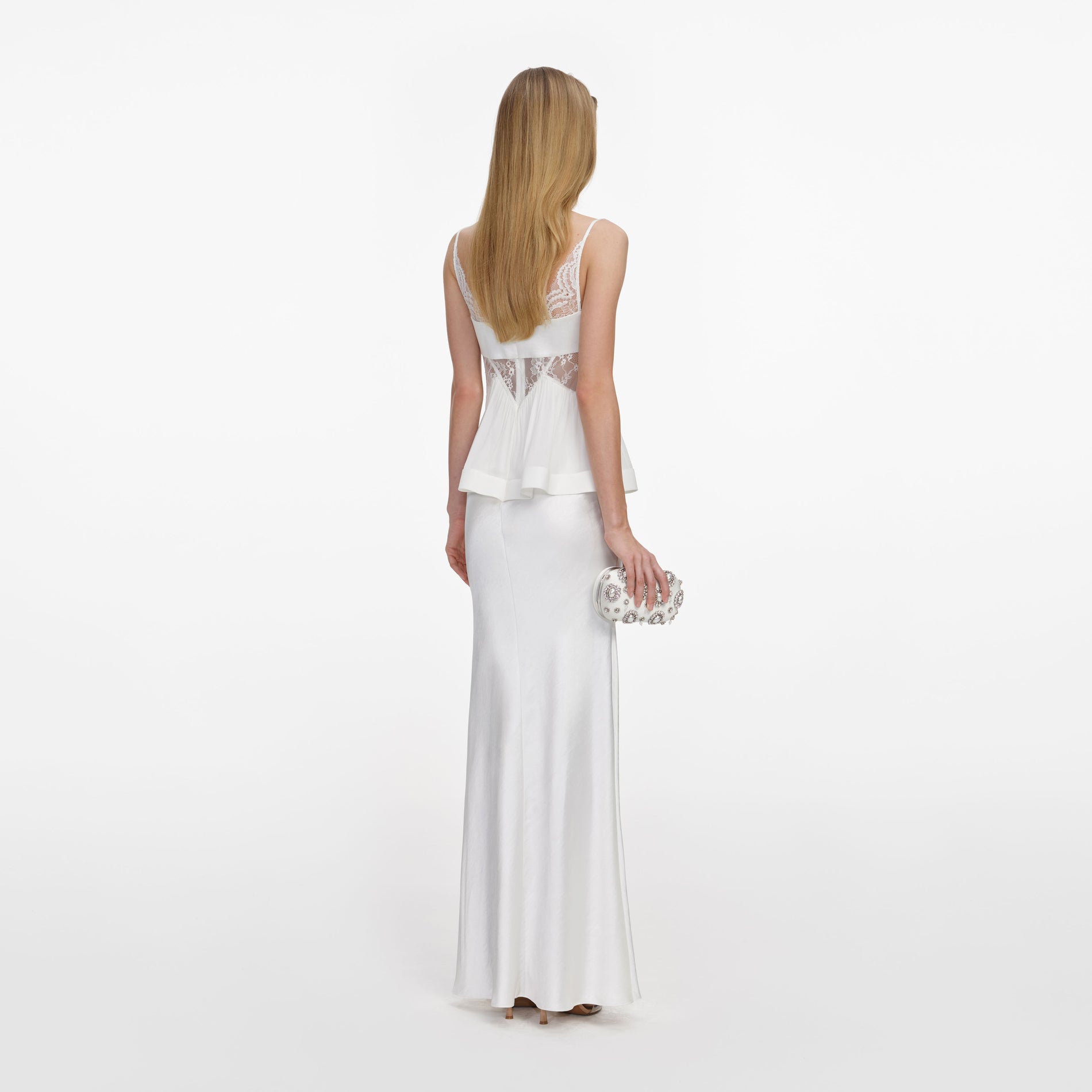 Back view of a woman wearing the White Georgette Satin Maxi Dress