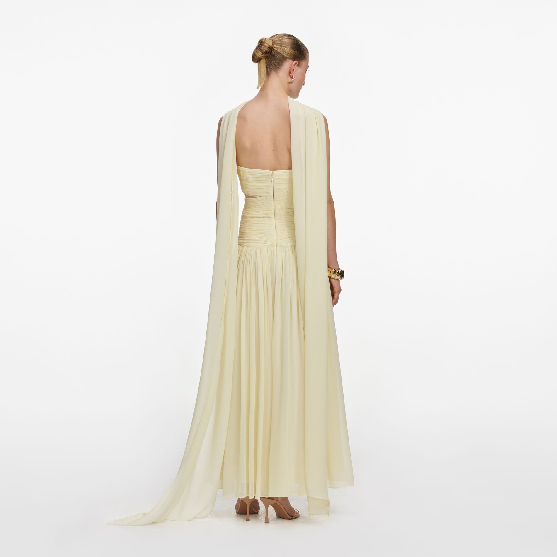 Back view of a woman wearing the Yellow Georgette Scarf Midi Dress
