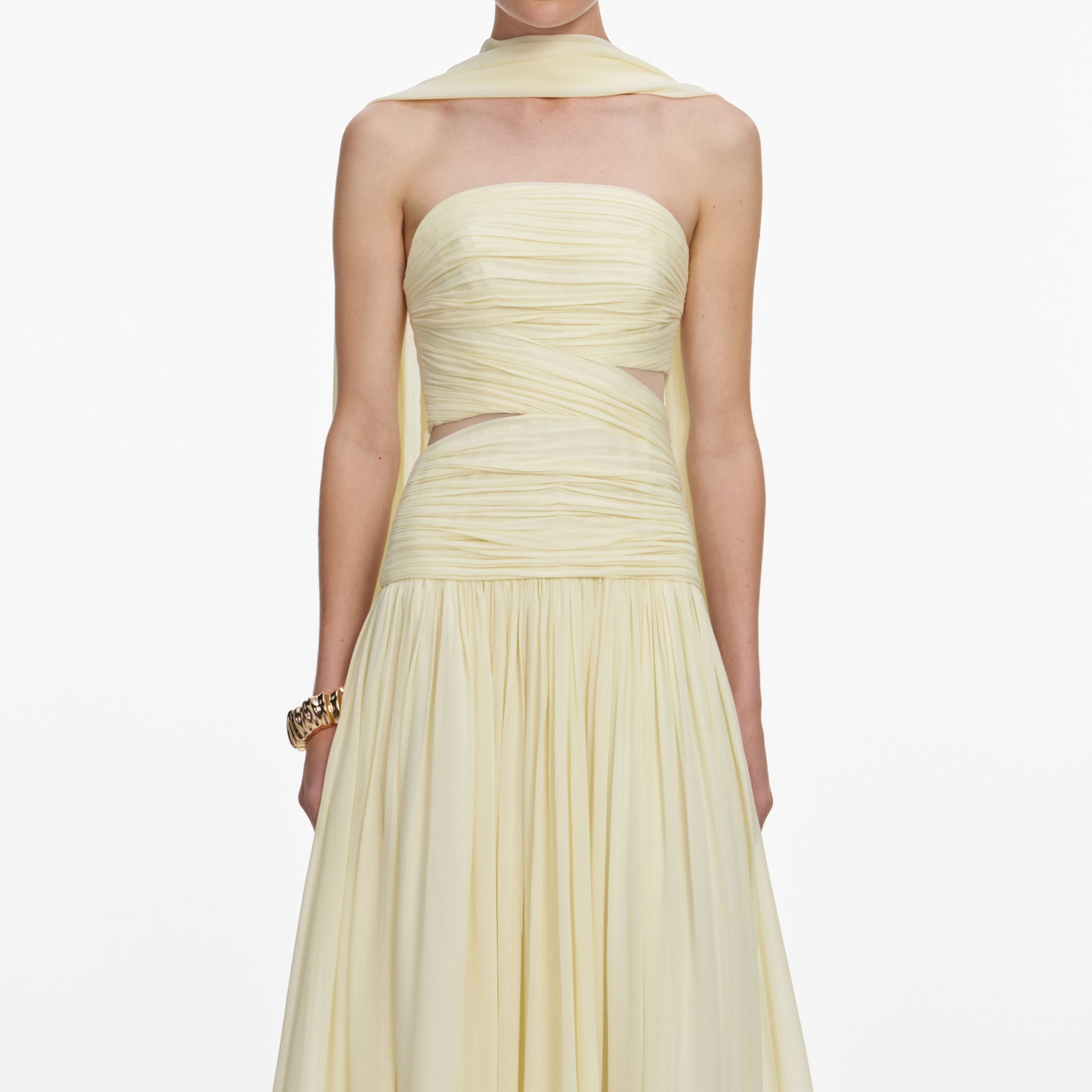 A close up of a woman wearing the Yellow Georgette Scarf Midi Dress