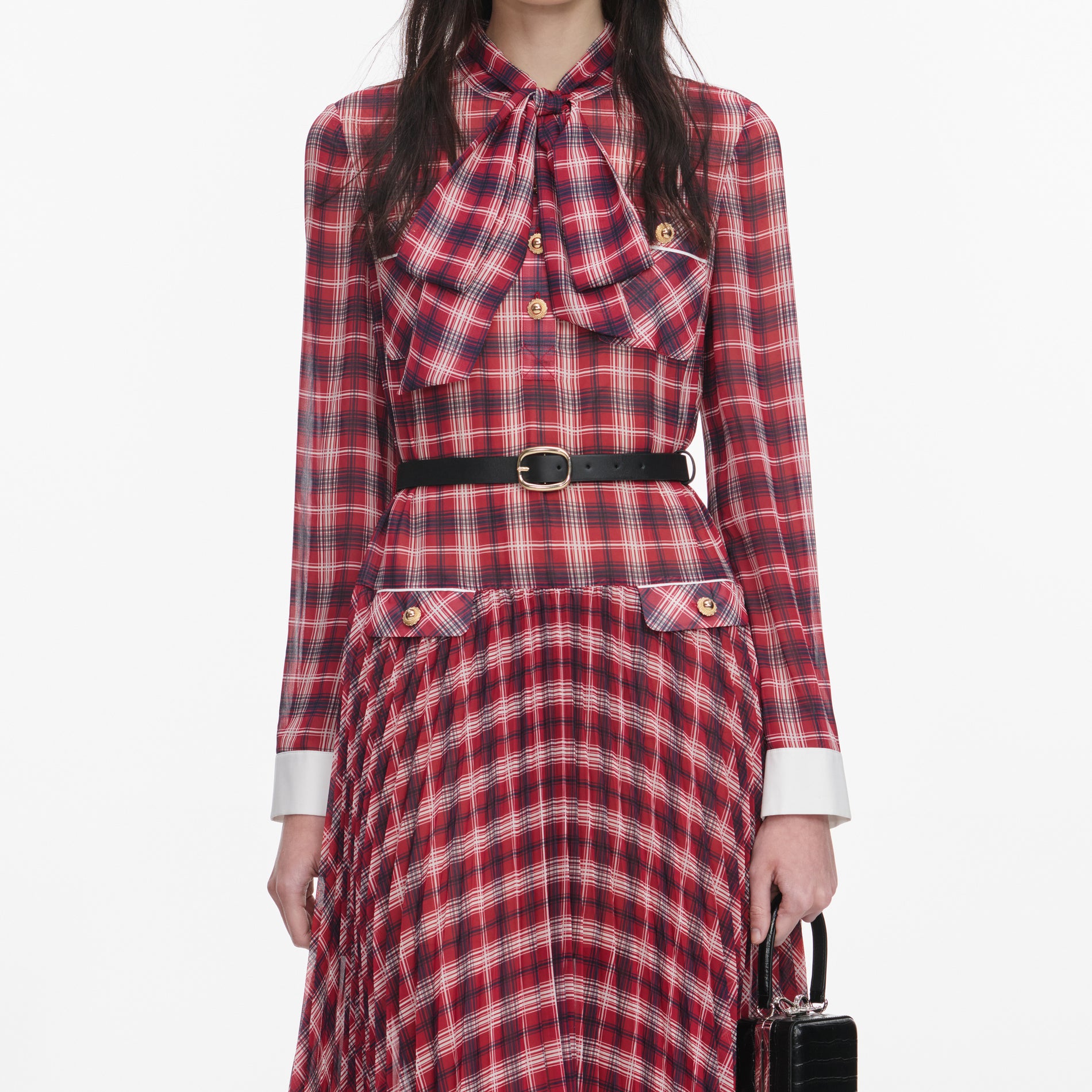 A close up of a woman wearing the Burgundy Check Chiffon Midi Dress