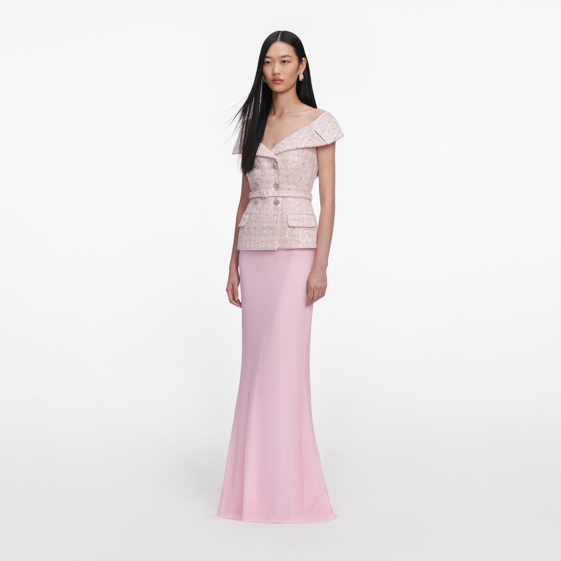 Side view of a woman wearing the Pink Sequin Boucle Maxi Dress