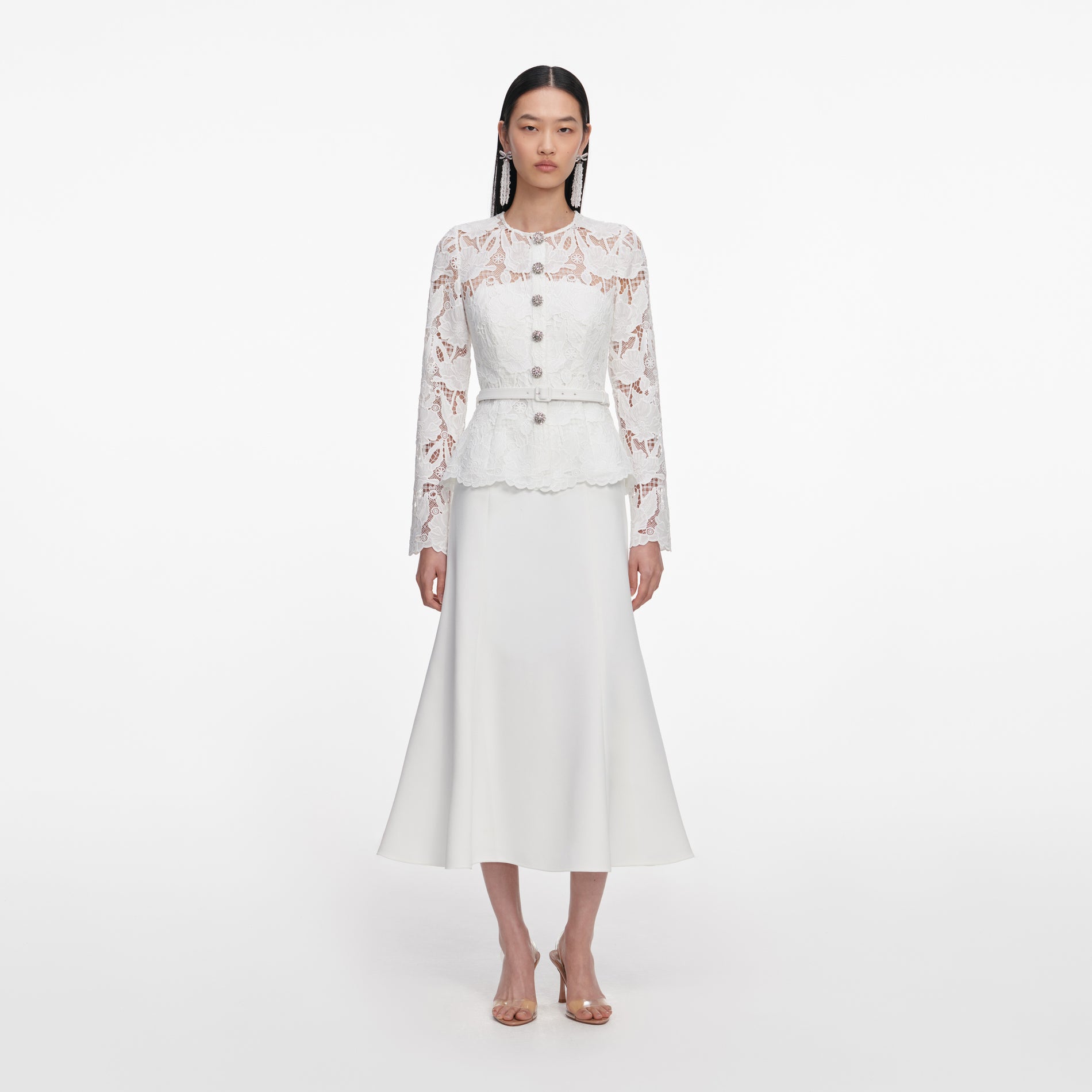 Front view of a woman wearing the White Lace Crepe Midi Dress