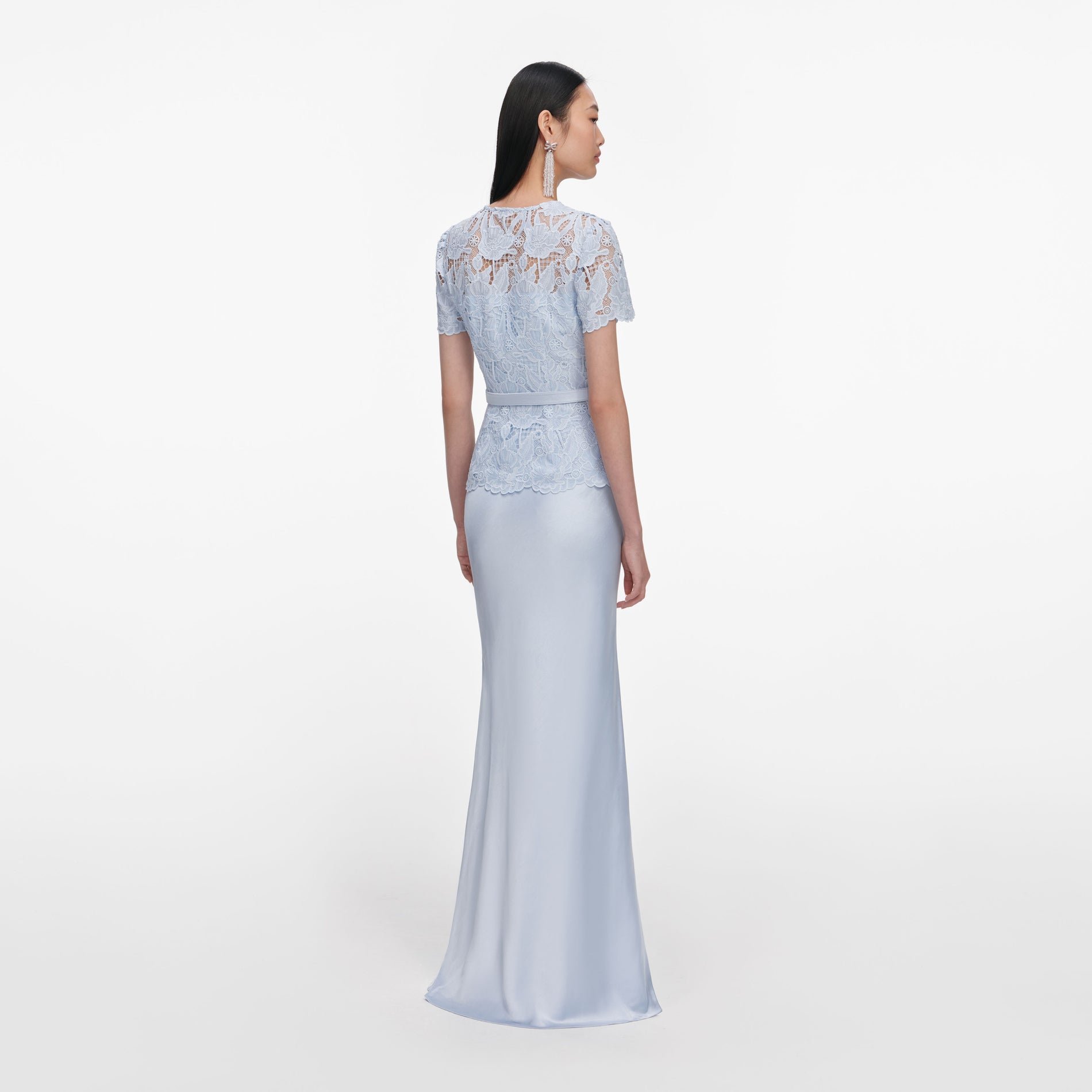 Back view of a woman wearing the Blue Lace Satin Maxi Dress