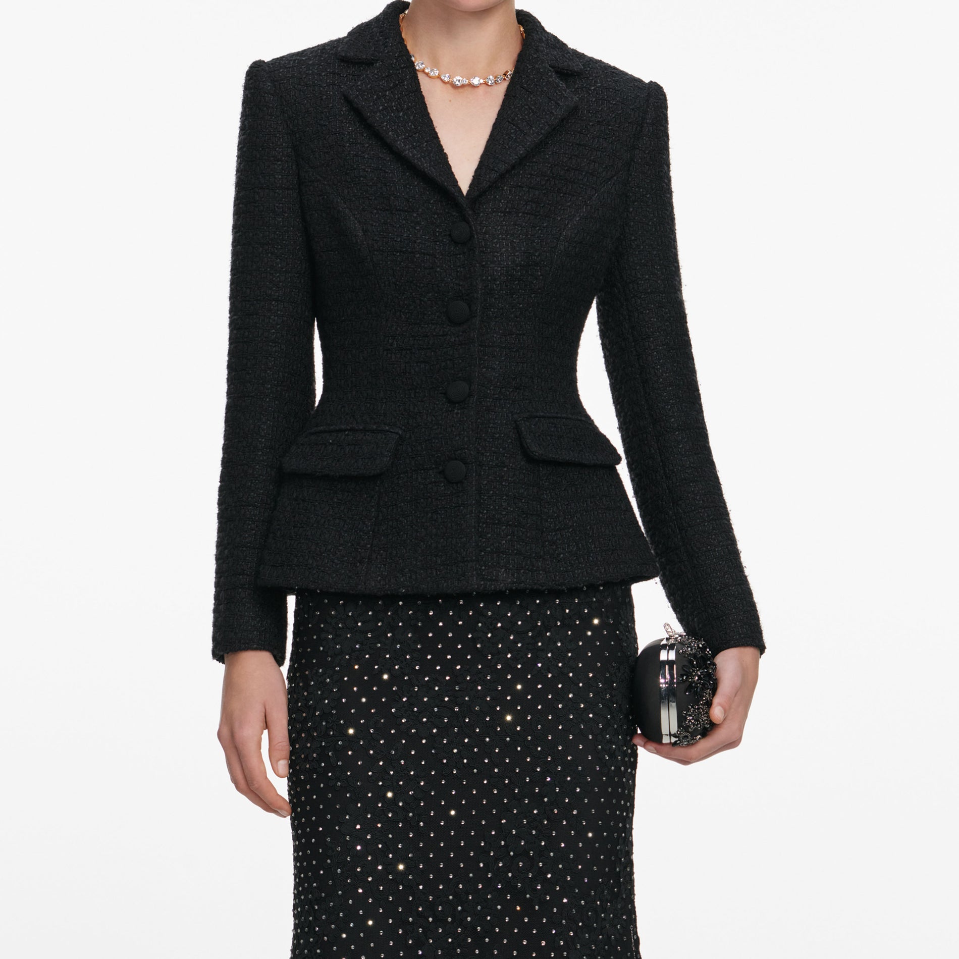 A close up of a woman wearing the Black Boucle Rhinestone Lace Maxi Dress