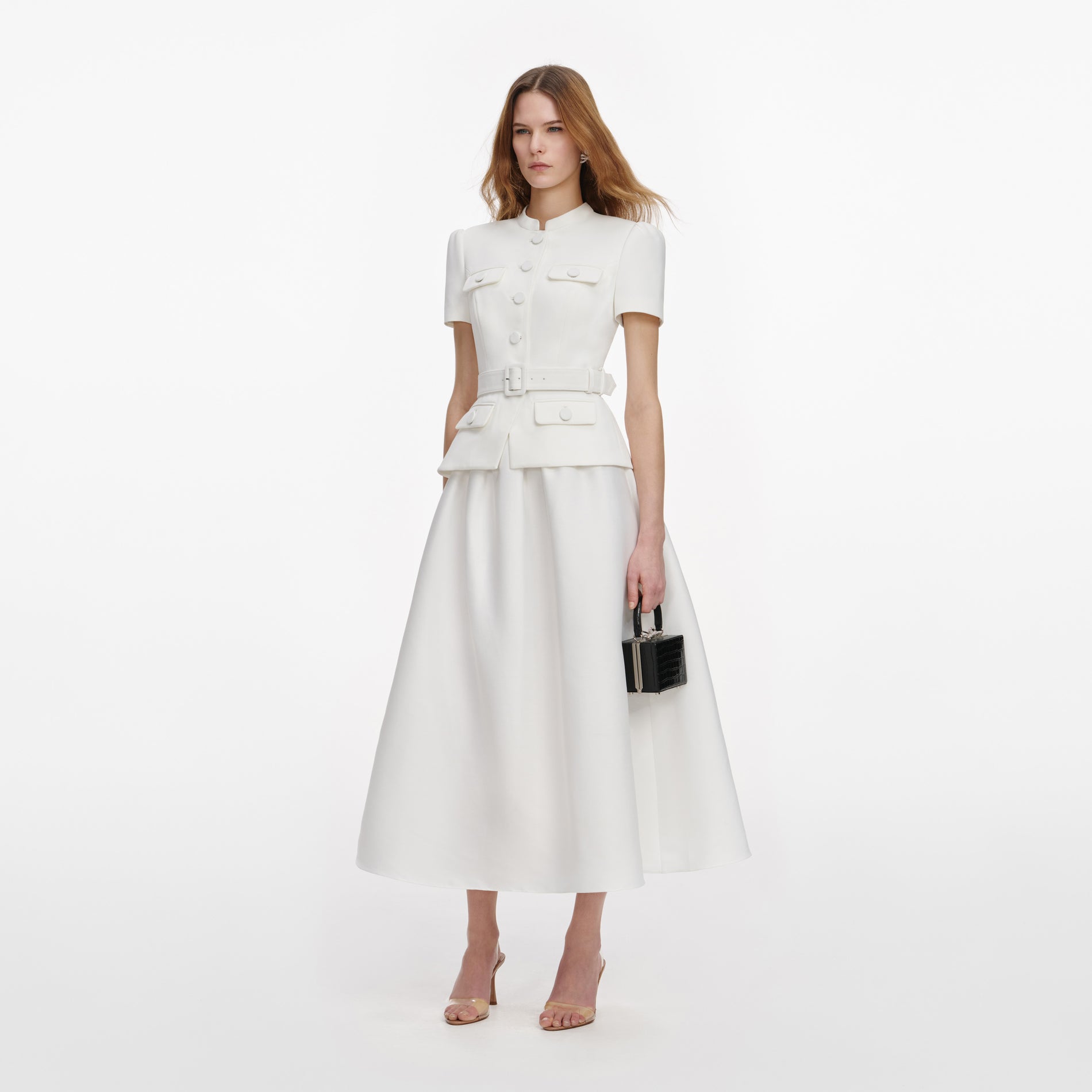 Side view of a woman wearing the White Tailored Taffeta Midi Dress