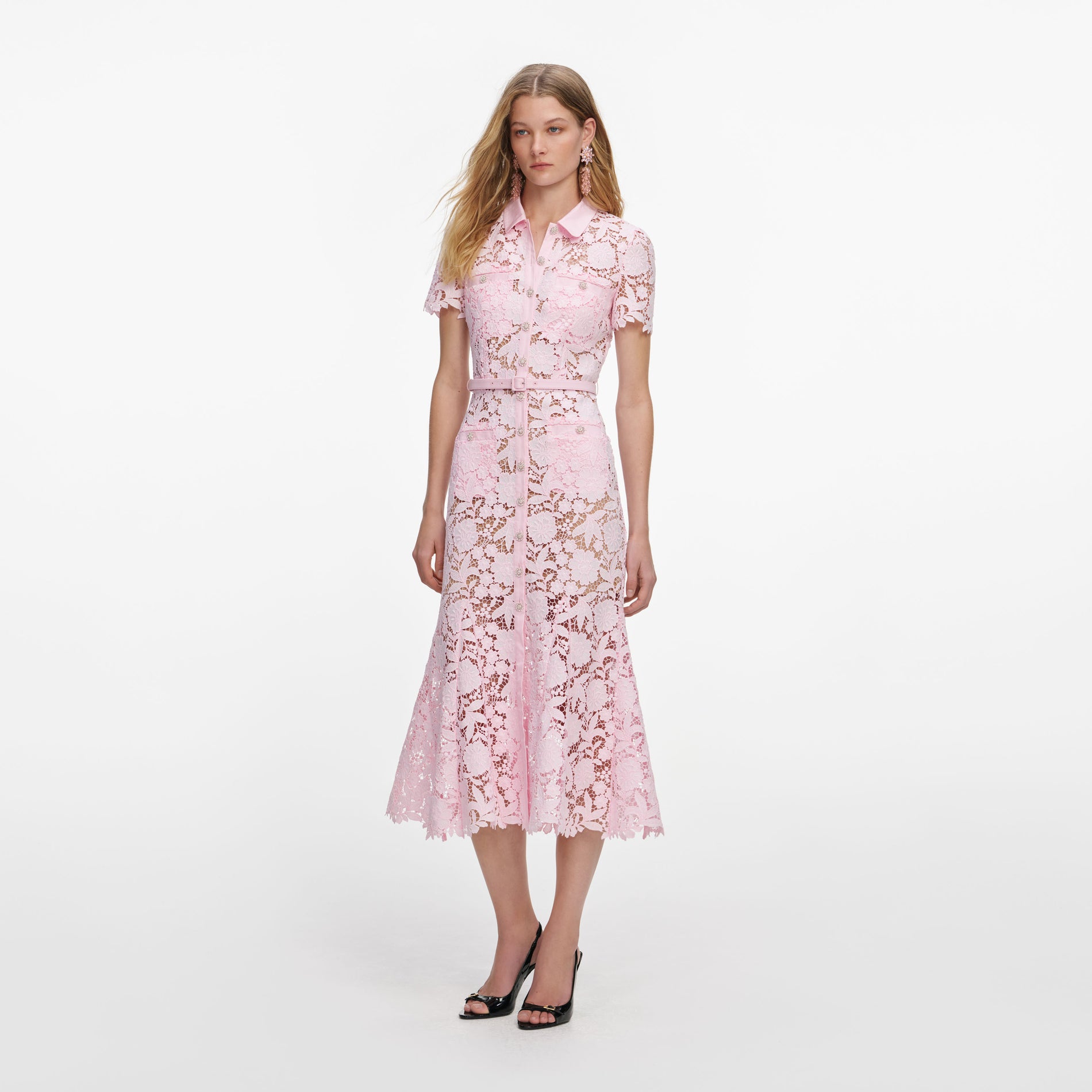 Side view of a woman wearing the Pink Lace Collared Midi Dress