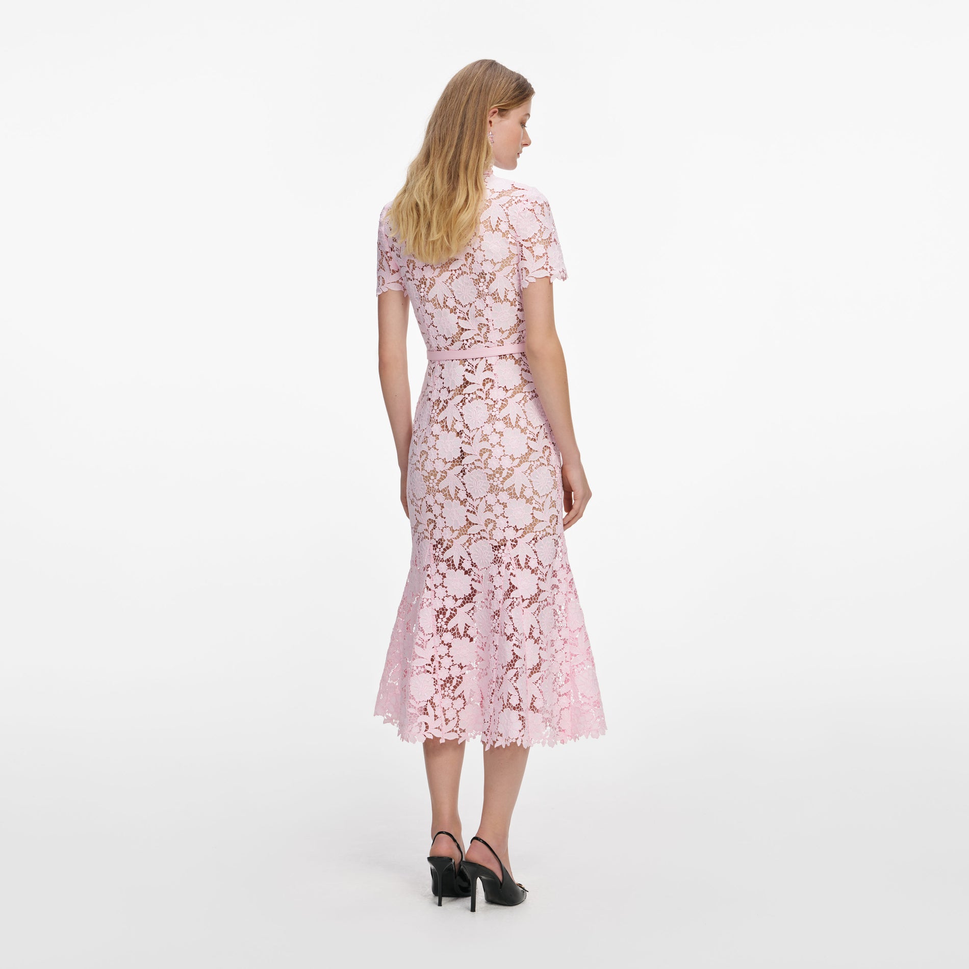 Back view of a woman wearing the Pink Lace Collared Midi Dress