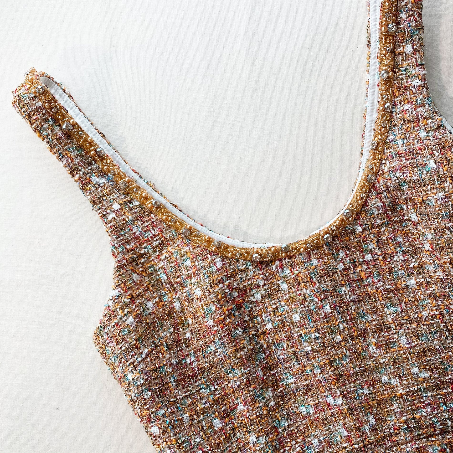 A close up of the fabric for the Gold Tinsel Bouclé Mini Dress