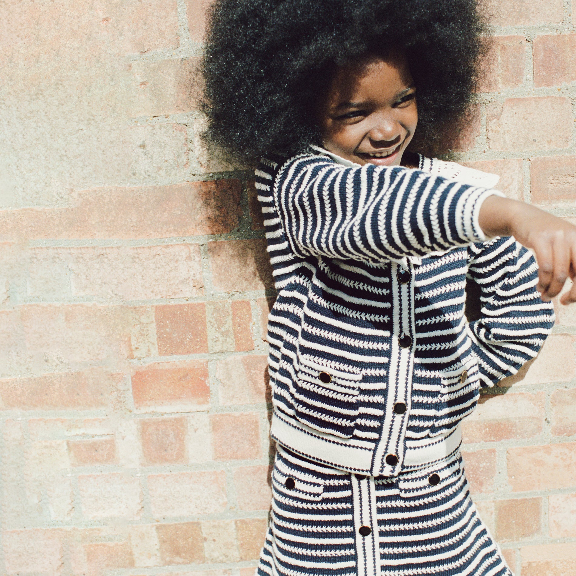 A close up of the fabric for the Navy Contrast Rope Knit Cardigan