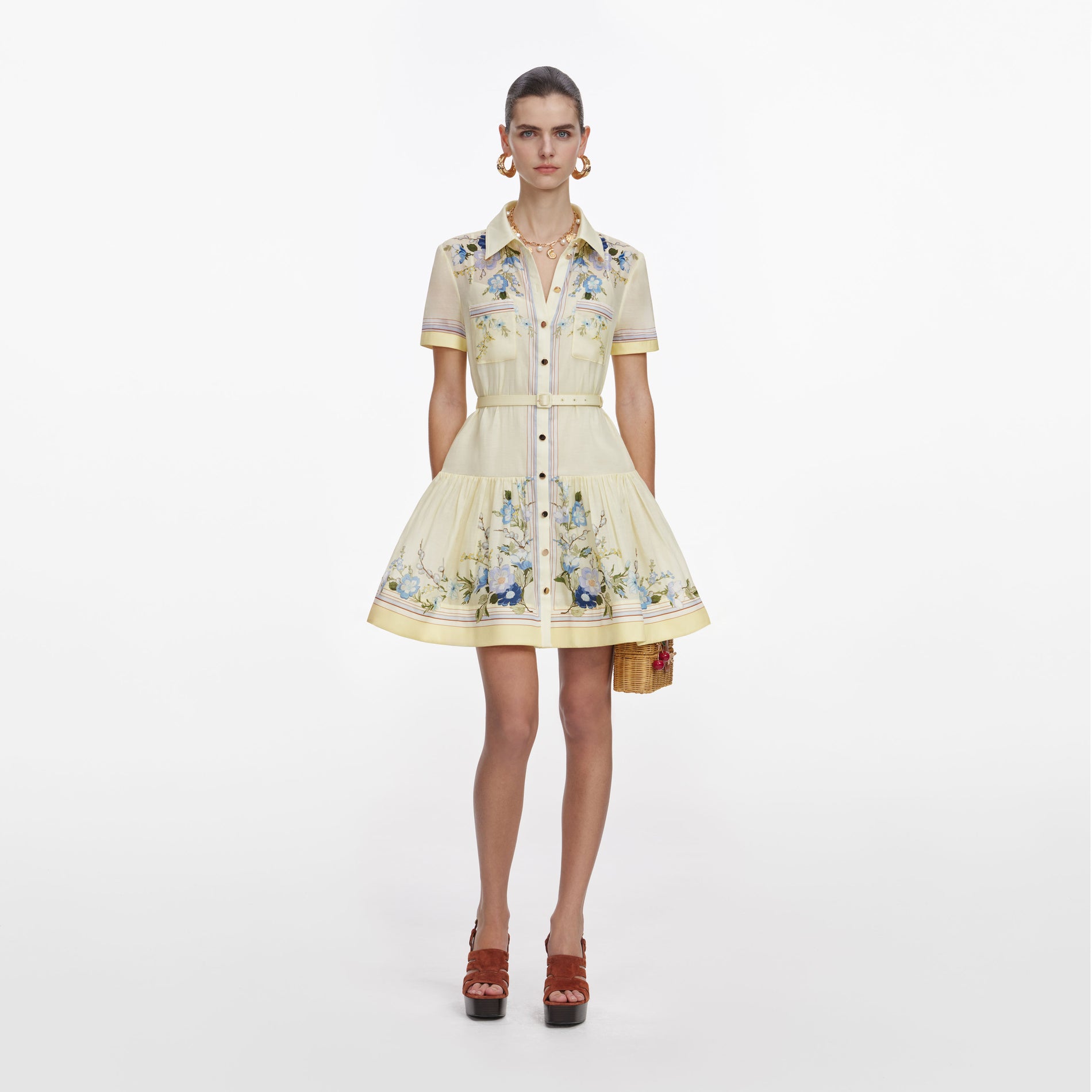 Front view of a woman wearing the Yellow Floral Organza Mini Dress