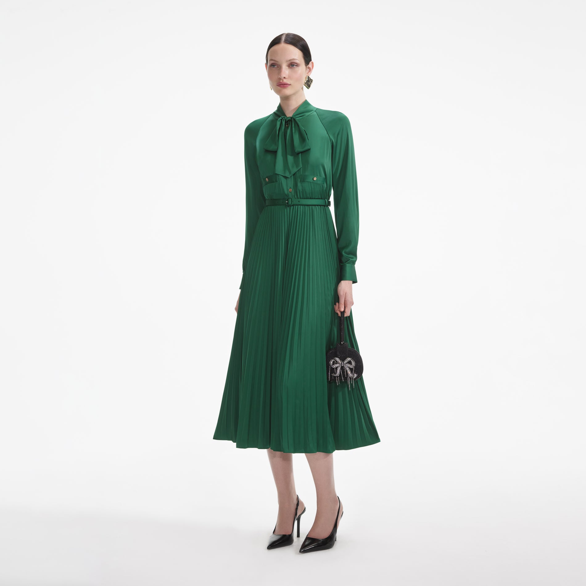 Side view of a woman wearing the Green Satin Midi Dress