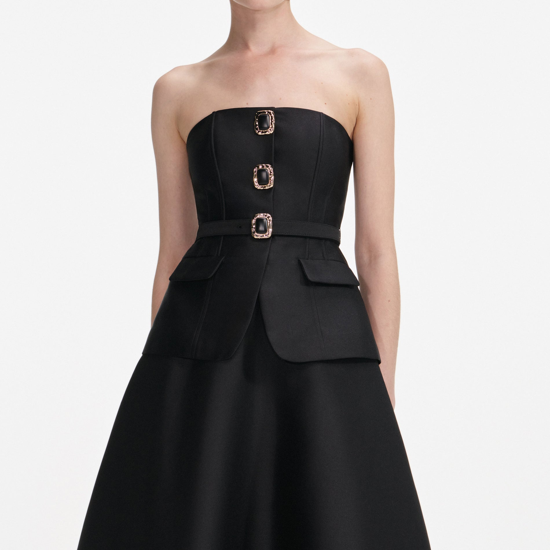 A close up of a woman wearing the Black Taffeta Bandeau Midi Dress