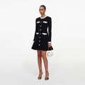 Black Chenille Knit Flower Trim Mini Dress