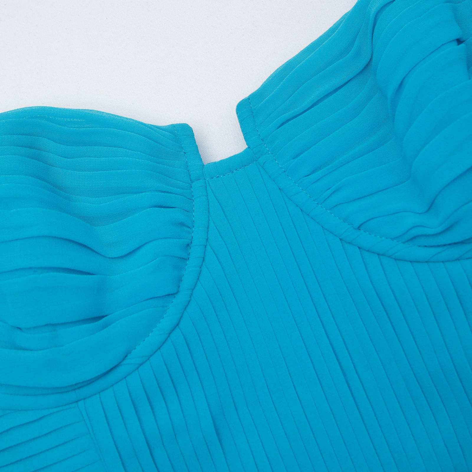 A close up of the fabric for the Blue Chiffon Lace Midi Dress