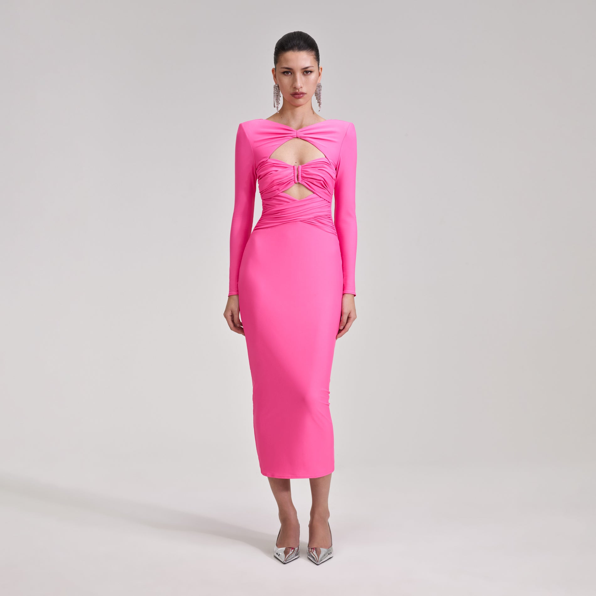 A woman wearing the Pink Jersey Midi Dress