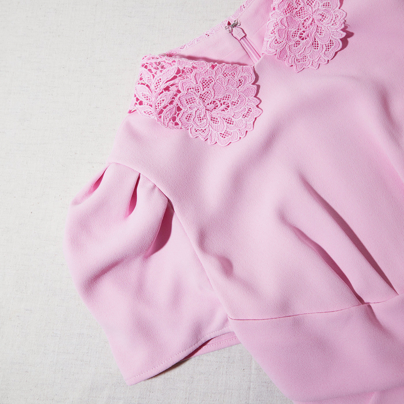 A close up of the fabric for the Pink Heavy Crepe Midi Dress