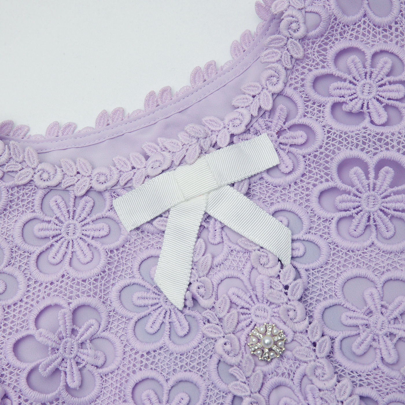 A close up of the fabric for the Lilac Floral Lace Jacket