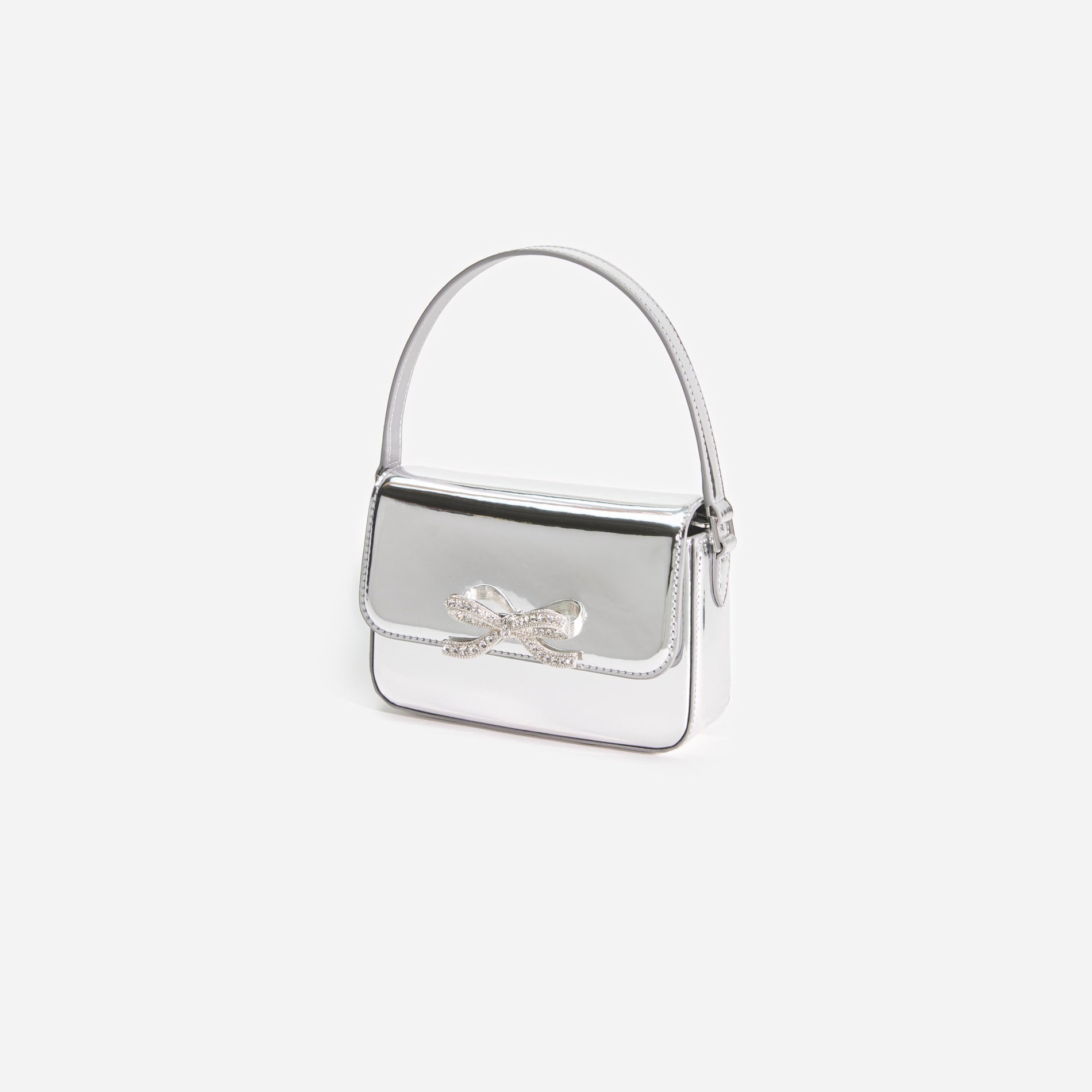 Side view of a woman wearing the Silver Leather Micro Bag