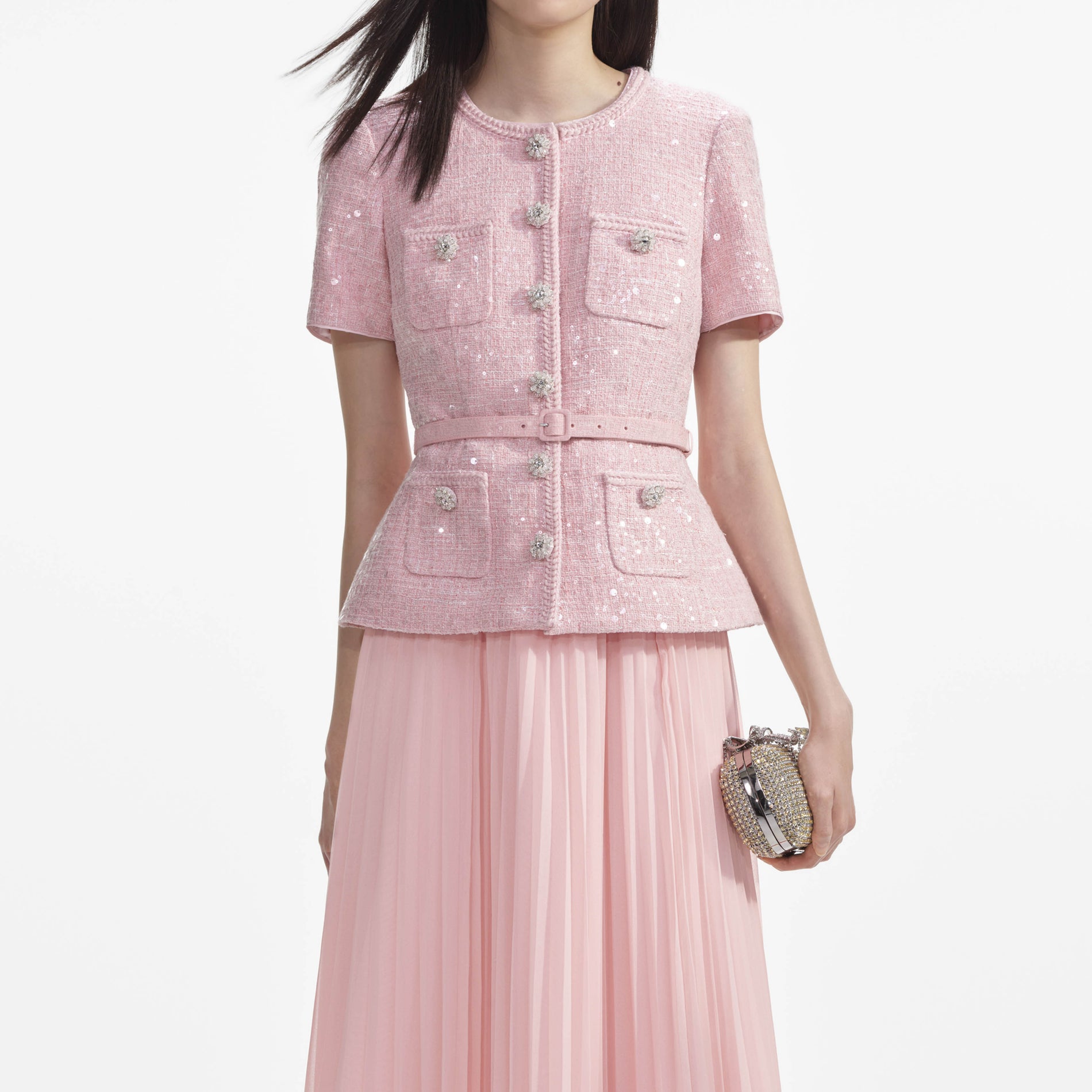 A close up of a woman wearing the Pink Boucle Midi Dress