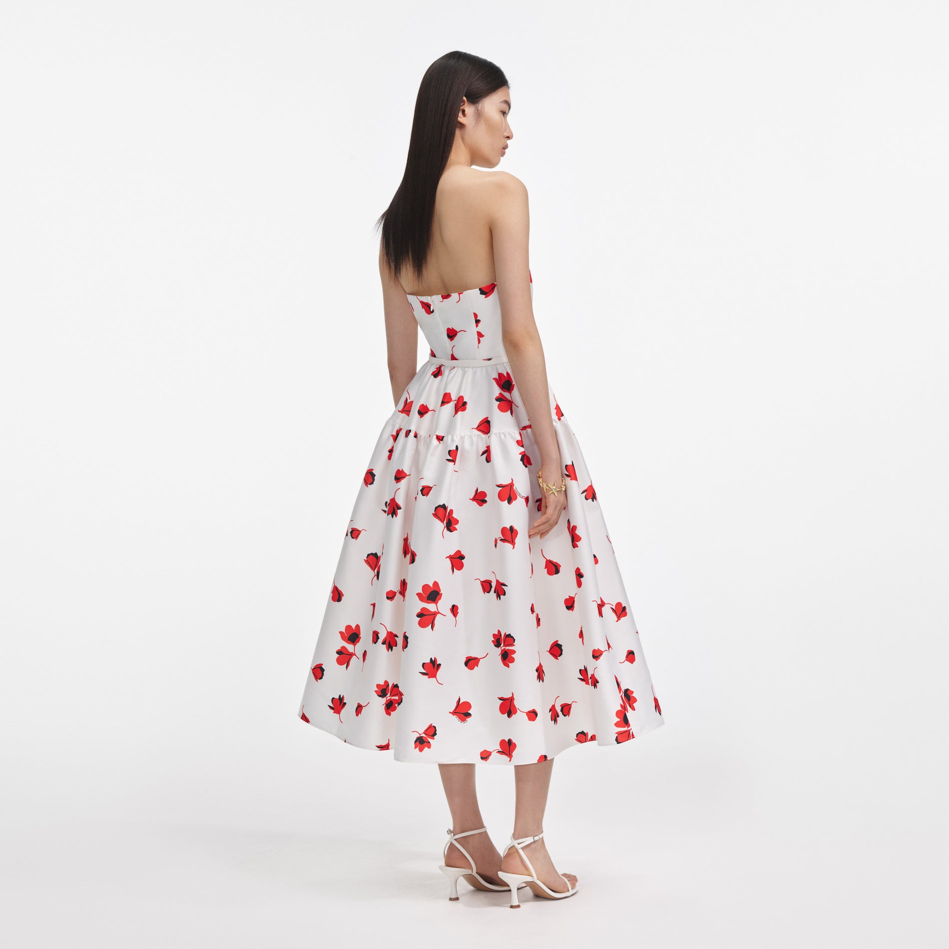 Back view of a woman wearing the Floral Print Taffeta Midi Dress