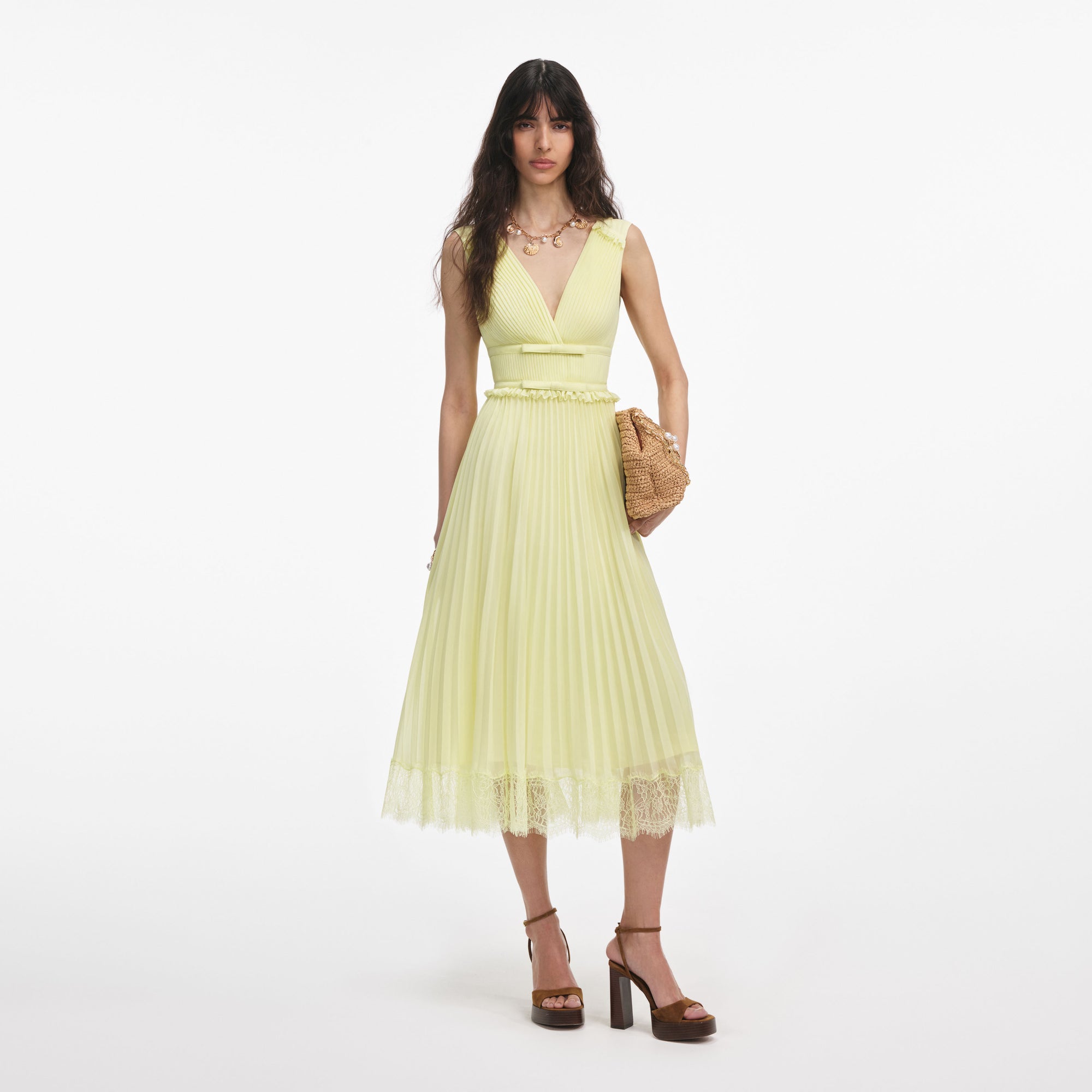 Front view of a woman wearing the Yellow Chiffon Midi Dress