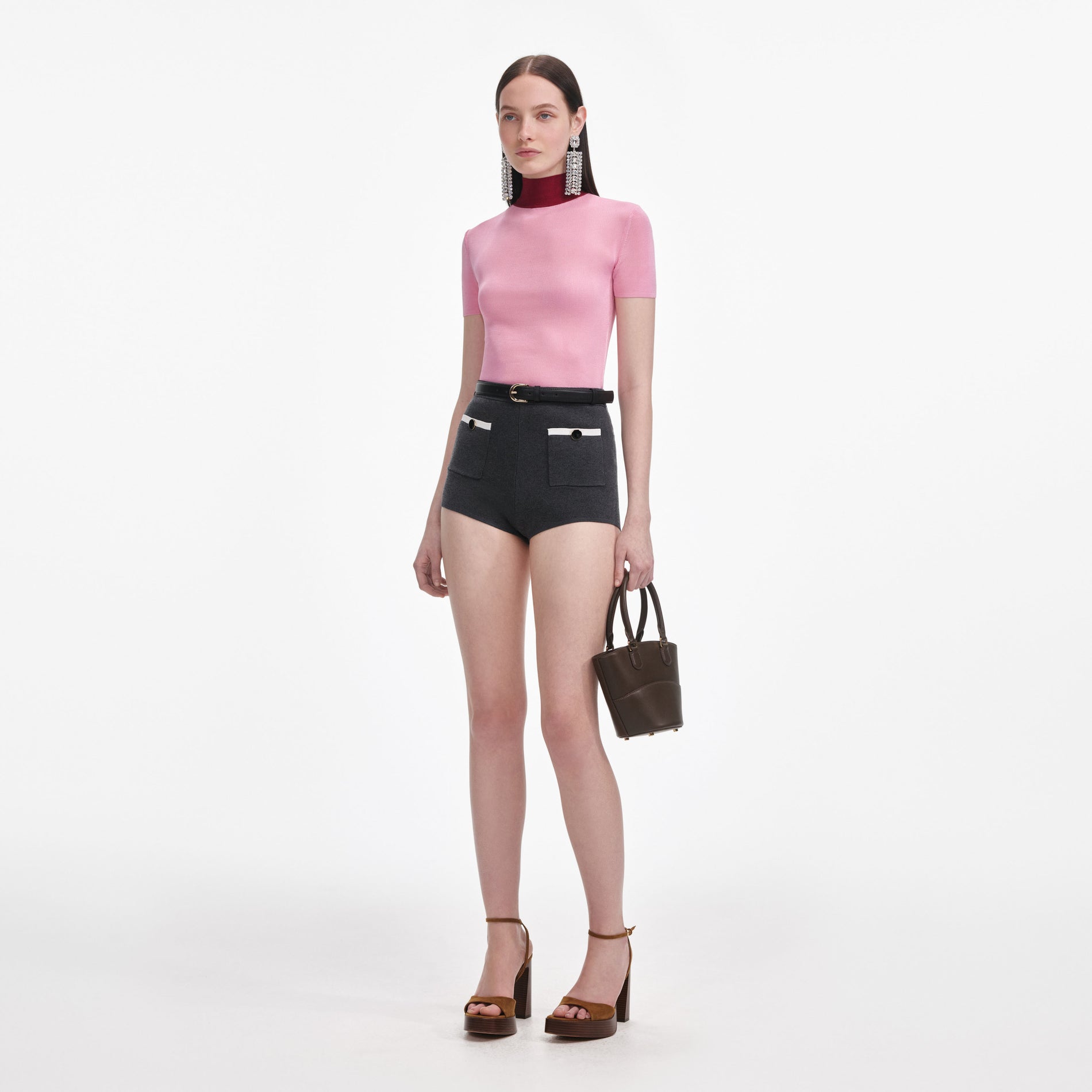 Side view of a woman wearing the Grey Knit Shorts