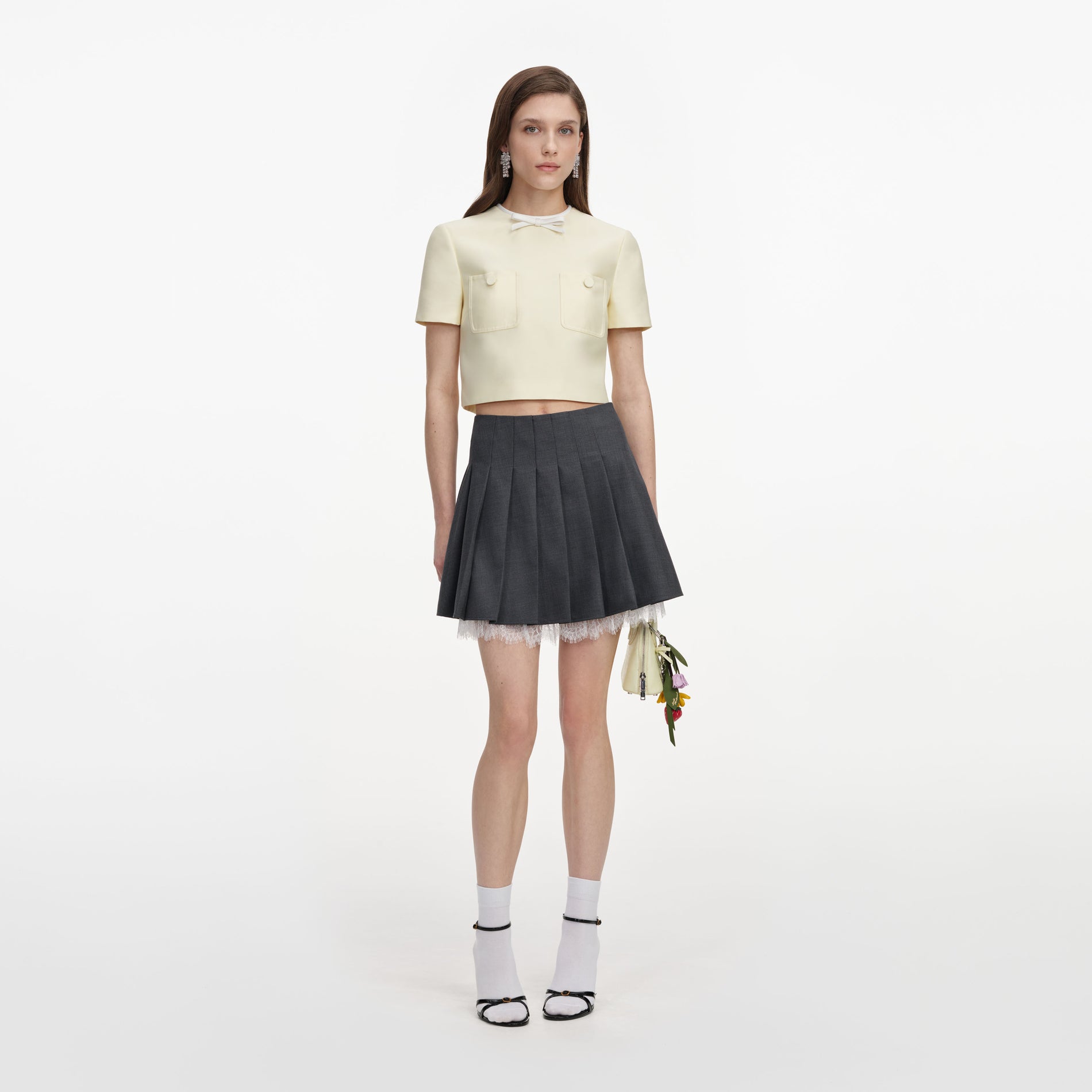 Front view of a woman wearing the Yellow Taffeta Top