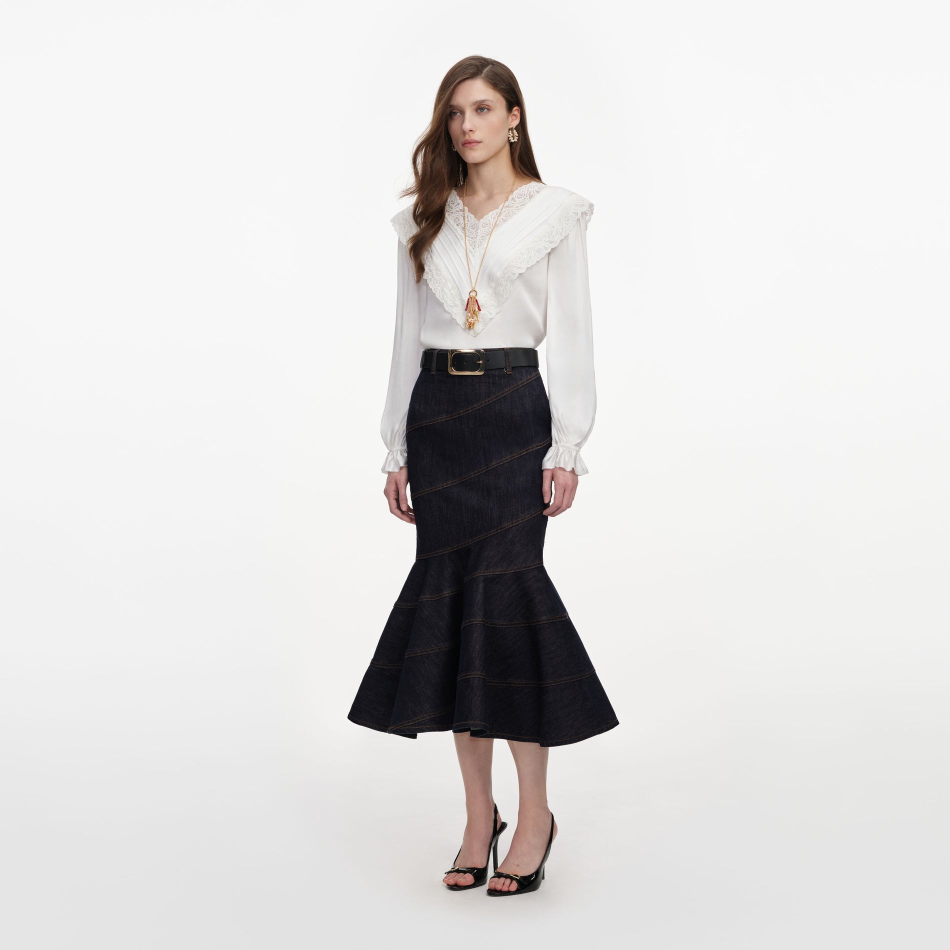 Side view of a woman wearing the Cream Viscose Lace Top