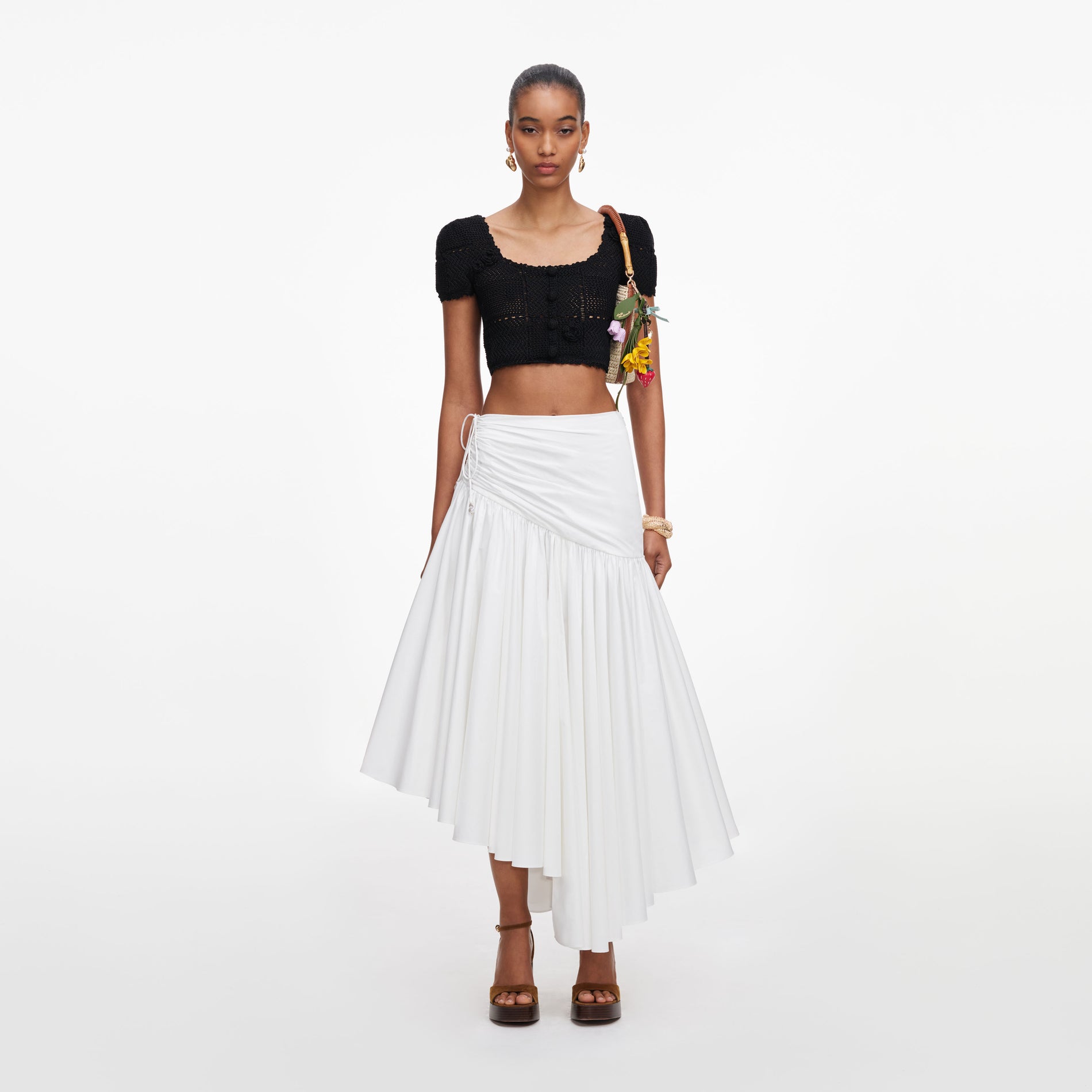 Front view of a woman wearing the Black Crochet Knit Crop Top