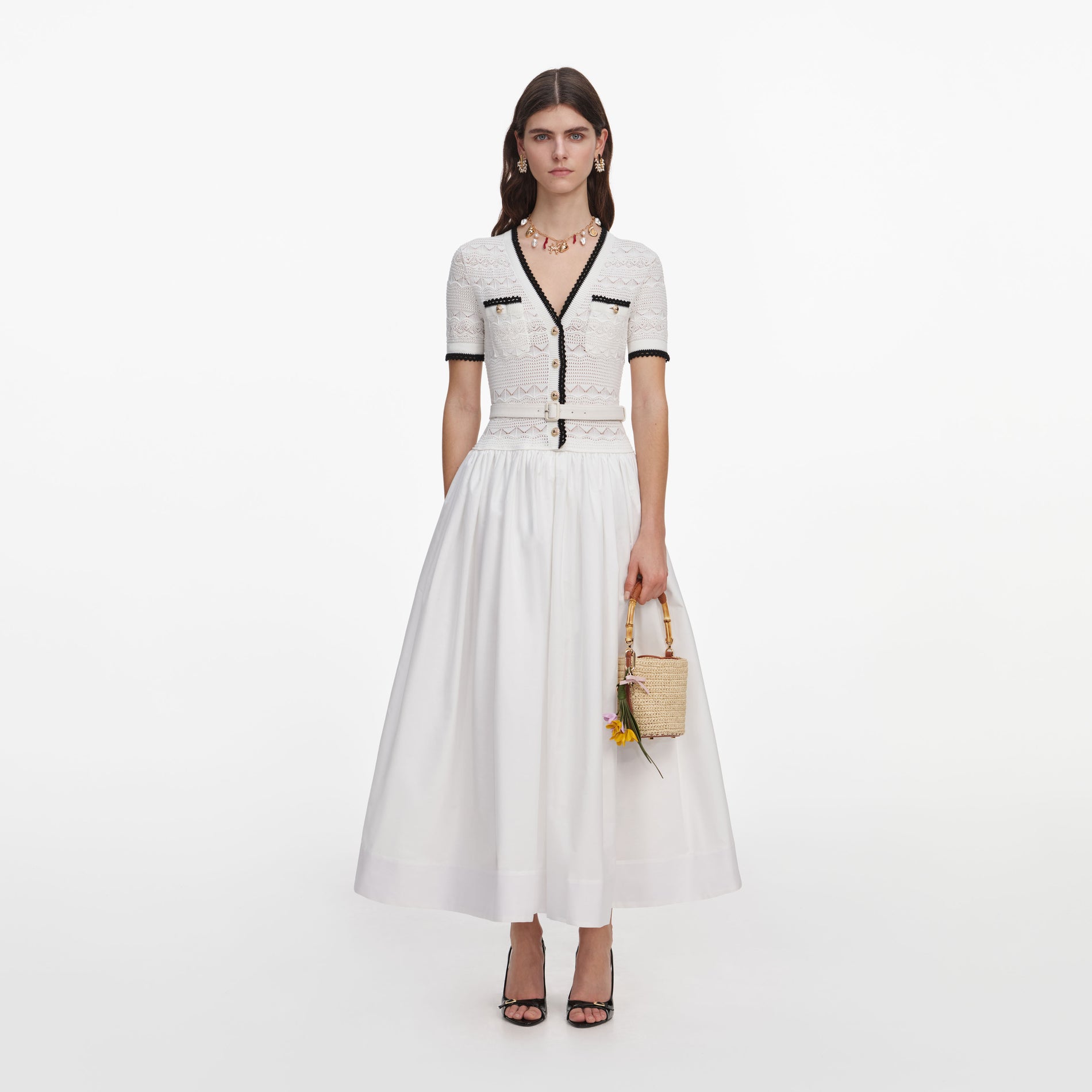 Front view of a woman wearing the White Knit Linen Midi Dress