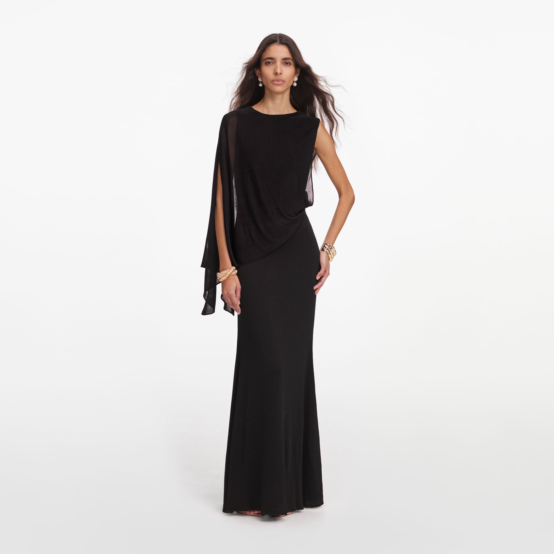 Front view of a woman wearing the Black Viscose Knit One Shoulder Maxi Dress
