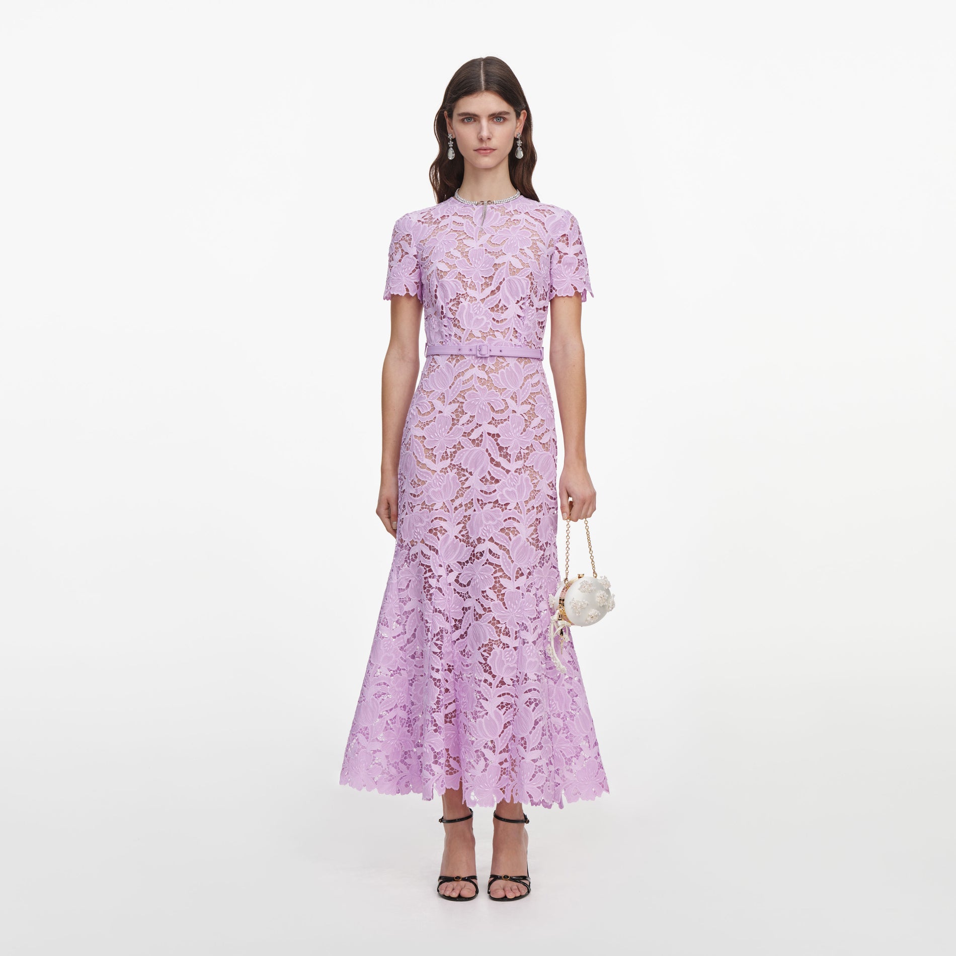 Front view of a woman wearing the Lilac Lace Midi Dress