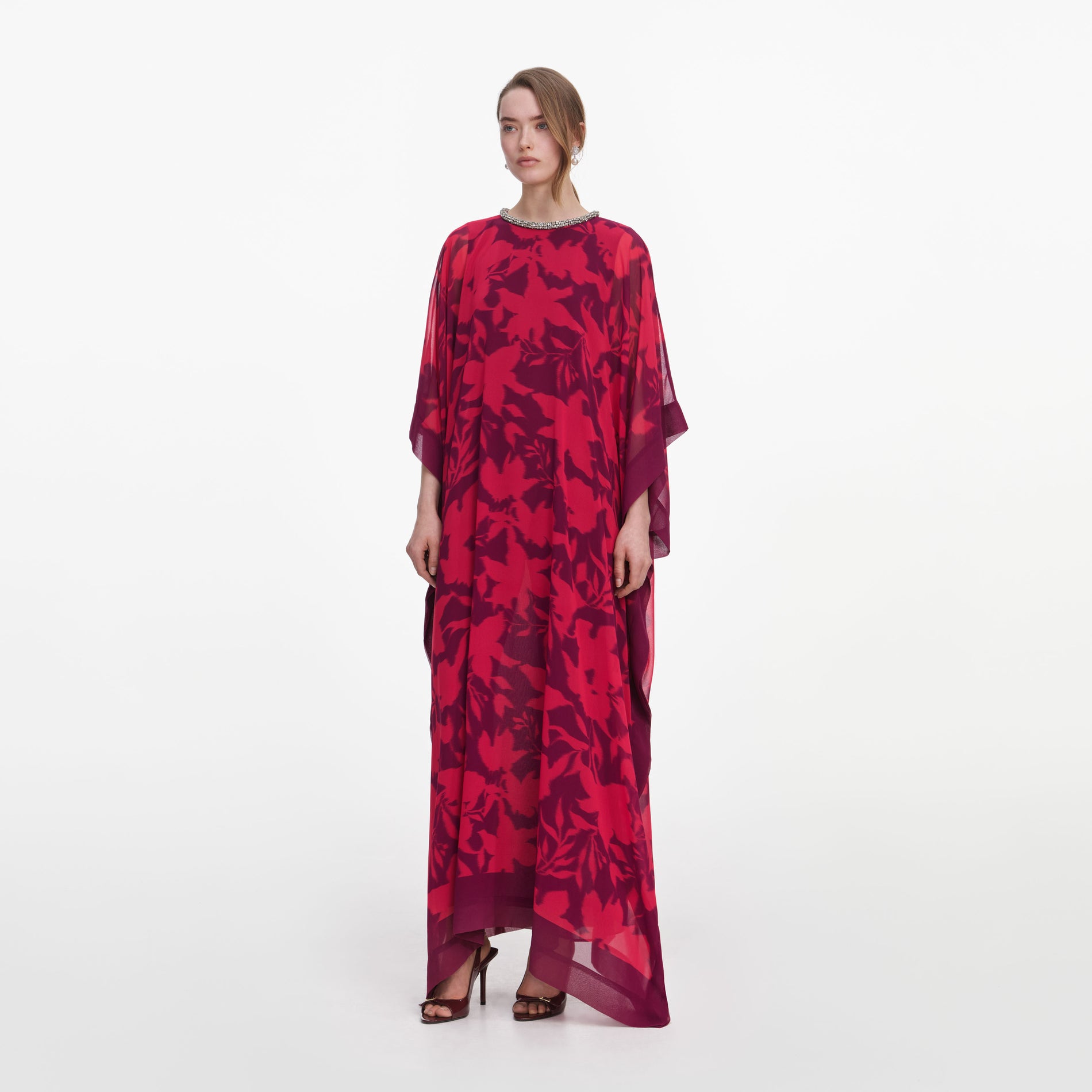 Side view of a woman wearing the Pink Floral Kaftan