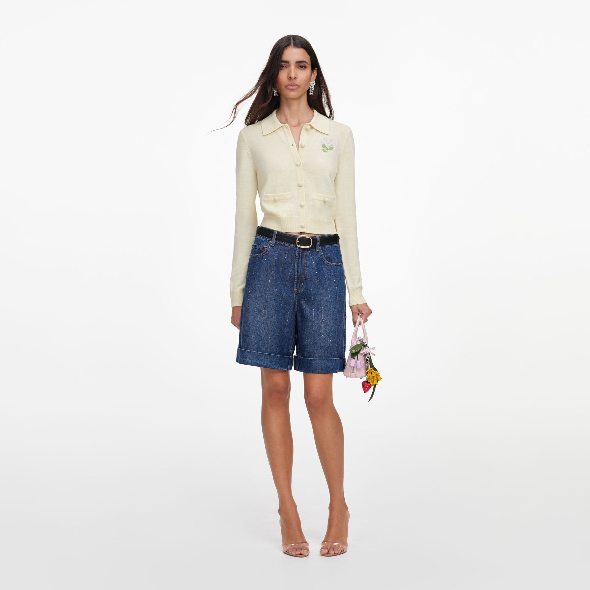 Front view of a woman wearing the Yellow Flower Embroidered Knit Cardigan