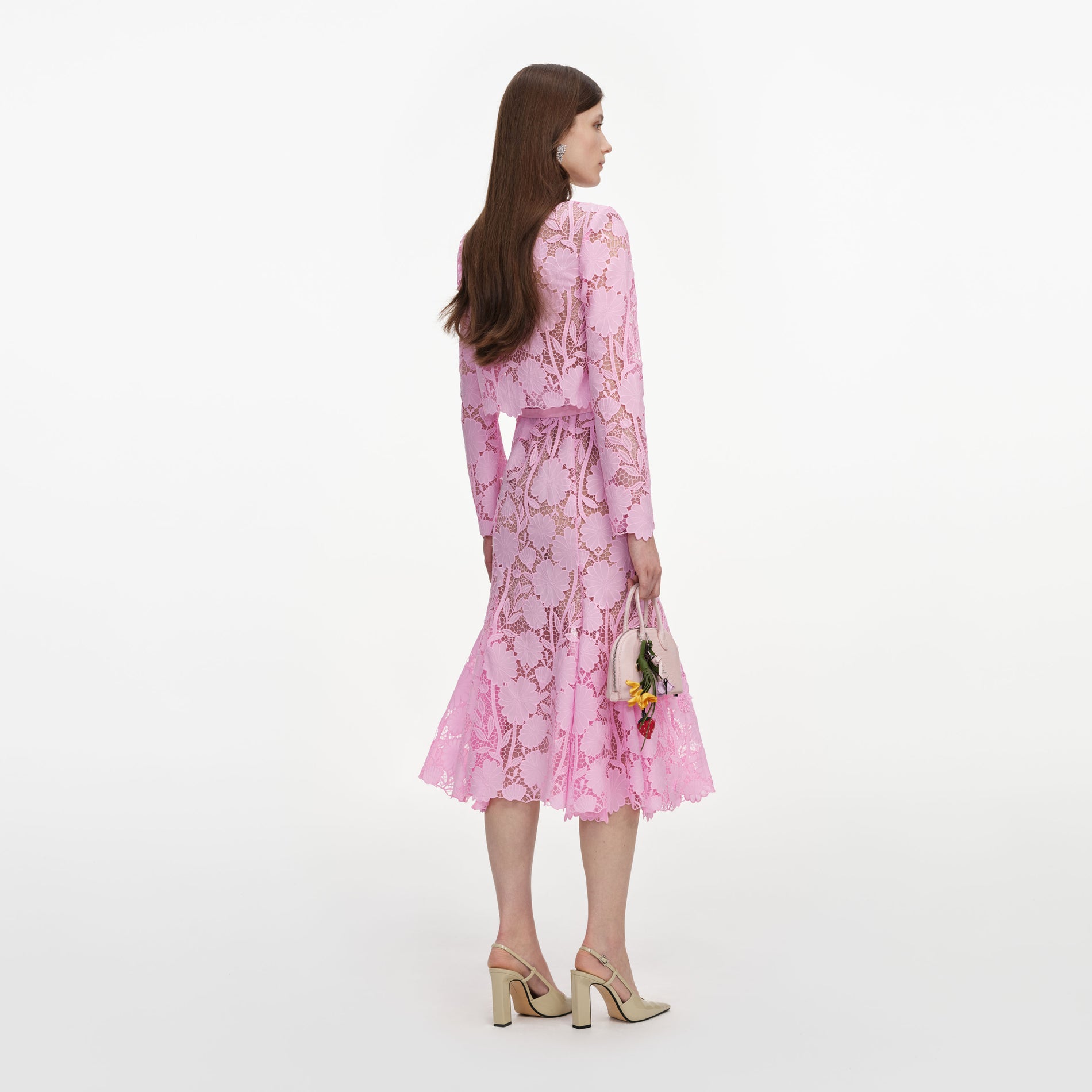 Back view of a woman wearing the Pink Lace Crystal Embellished Midi Dress