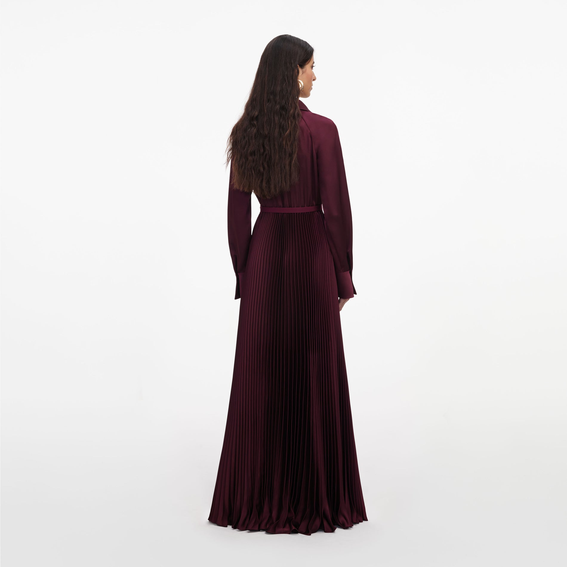 Back view of a woman wearing the Plum Satin Pleated Maxi Dress