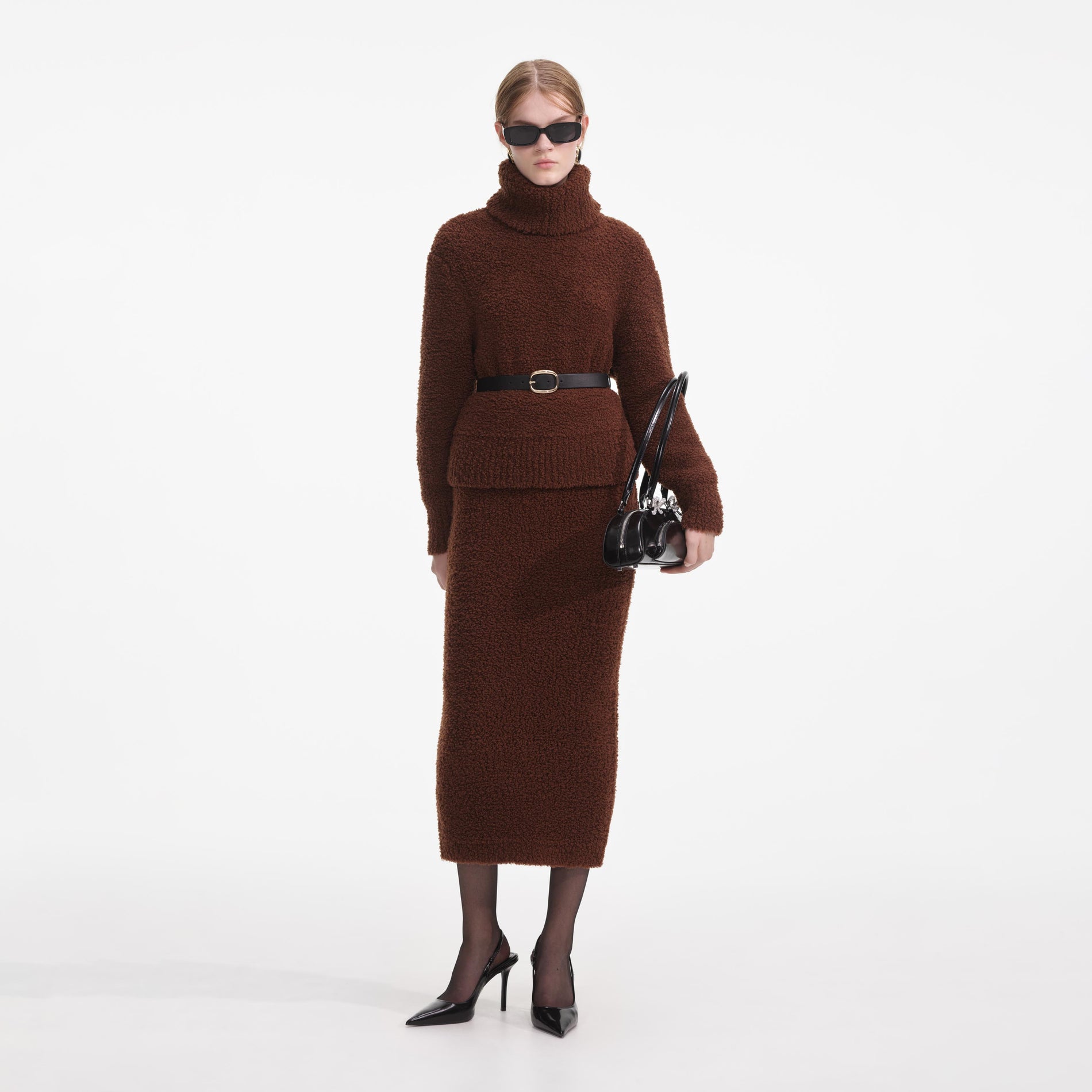 Front view of a woman wearing the Brown Fluffy Knit Midi Skirt