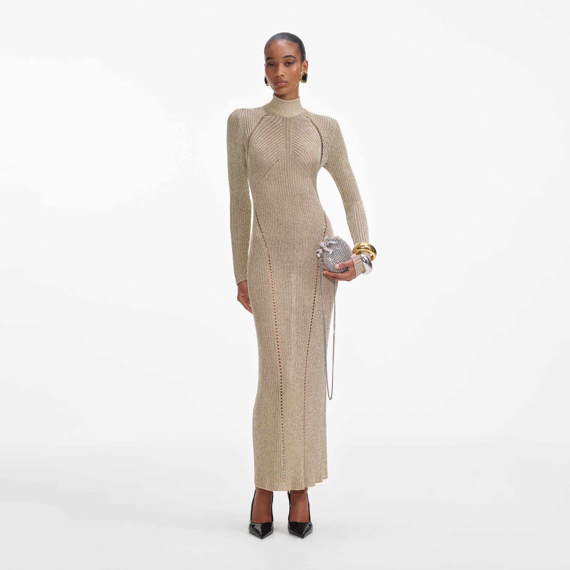 Front view of a woman wearing the Gold Lurex Knit Maxi Dress