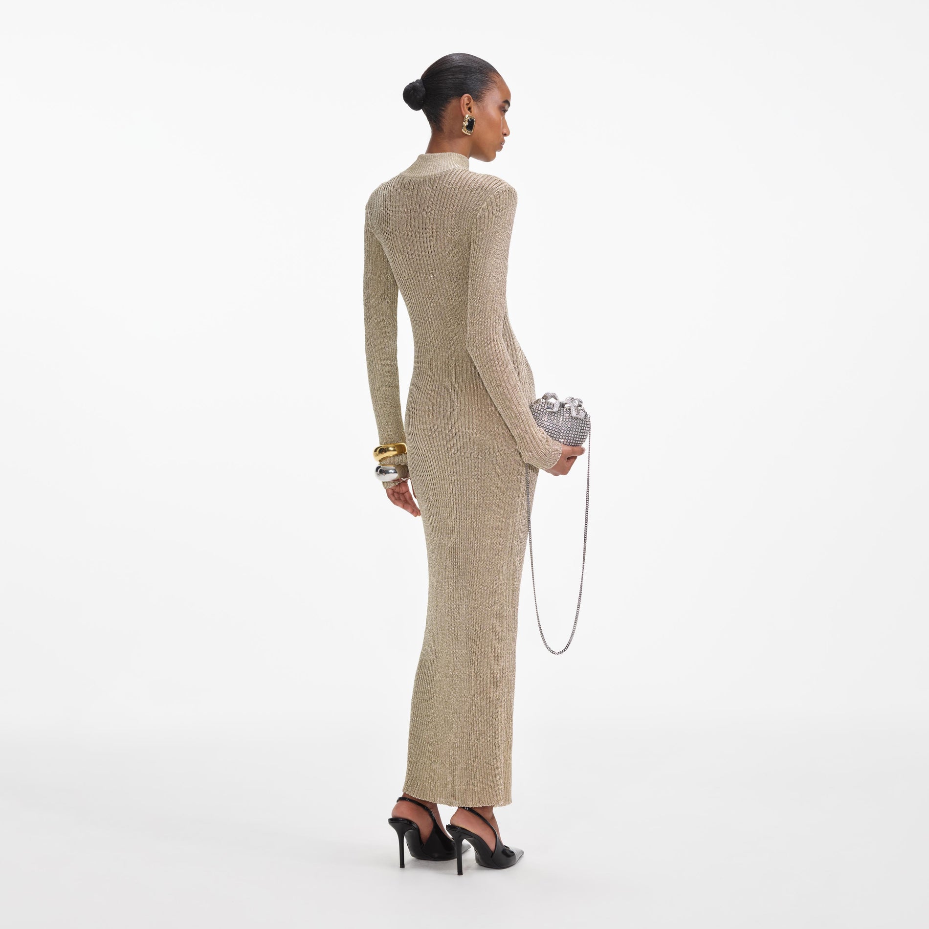 Back view of a woman wearing the Gold Lurex Knit Maxi Dress